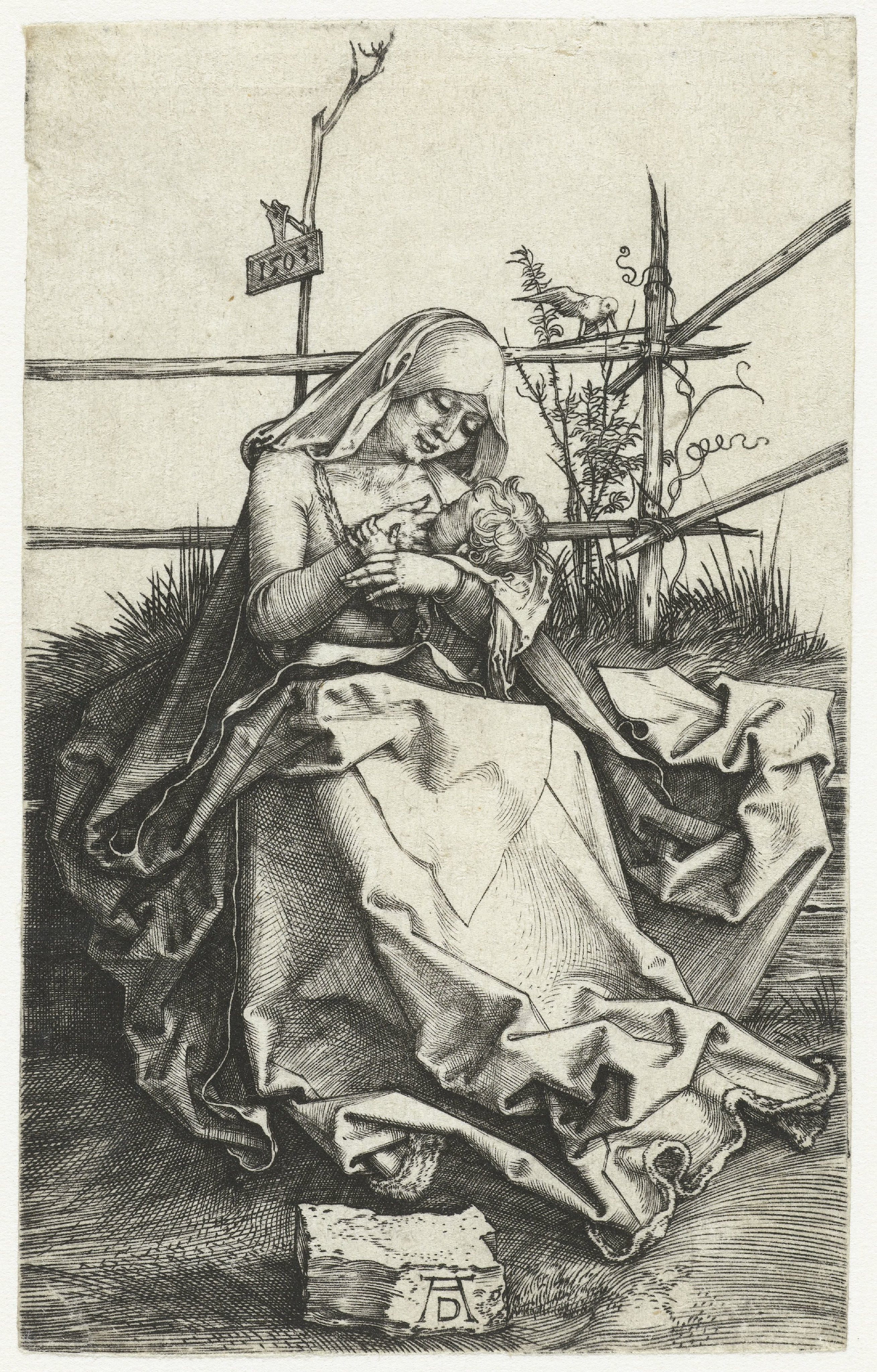 Maria met kind aan de borst bij een hek