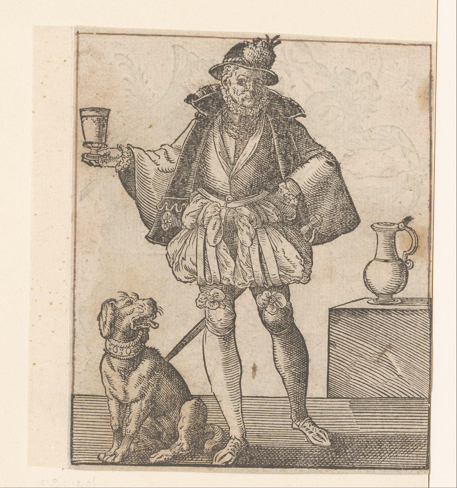 Man met een glas en een zittende hond