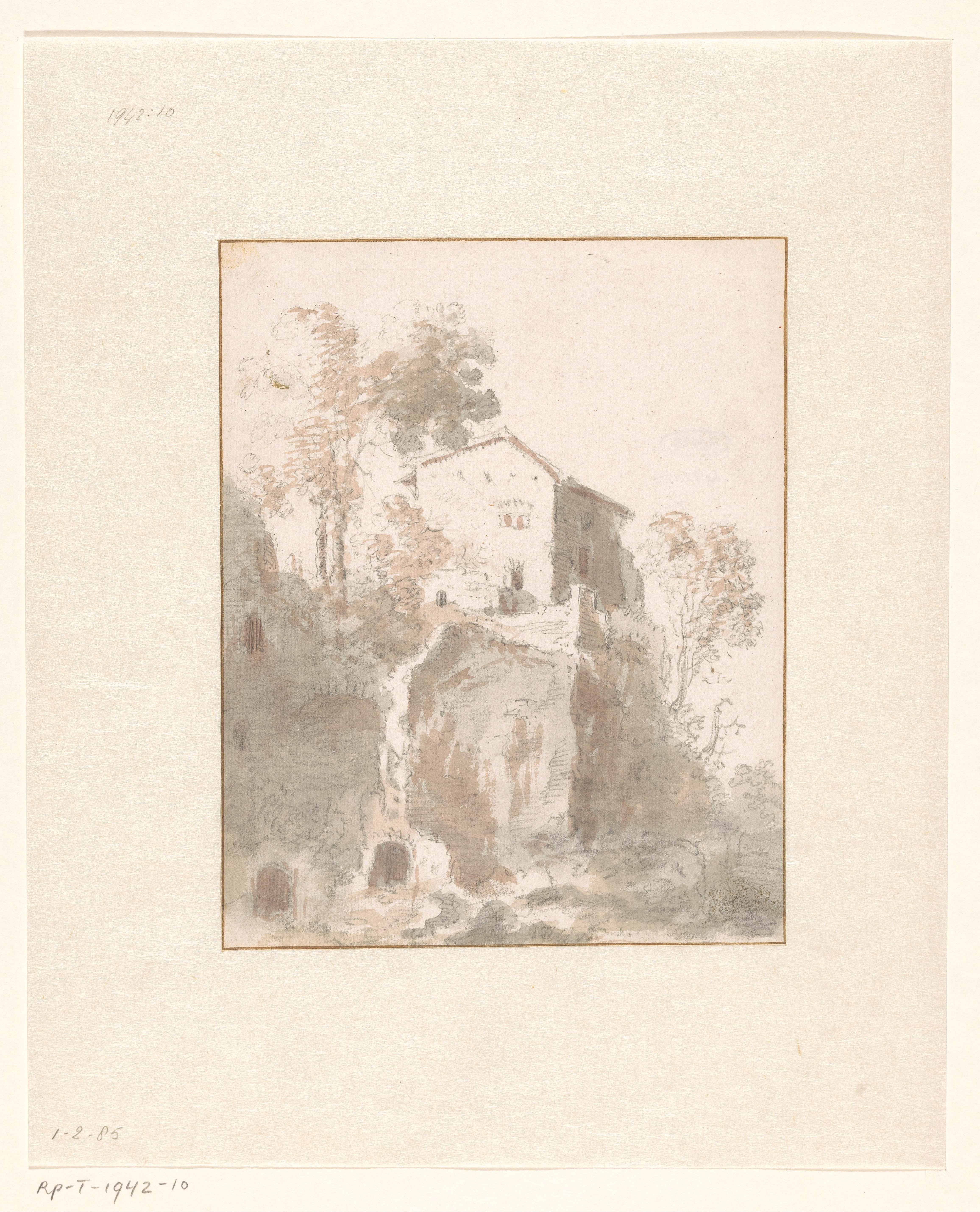 Rotsachtig landschap met een huis en bomen