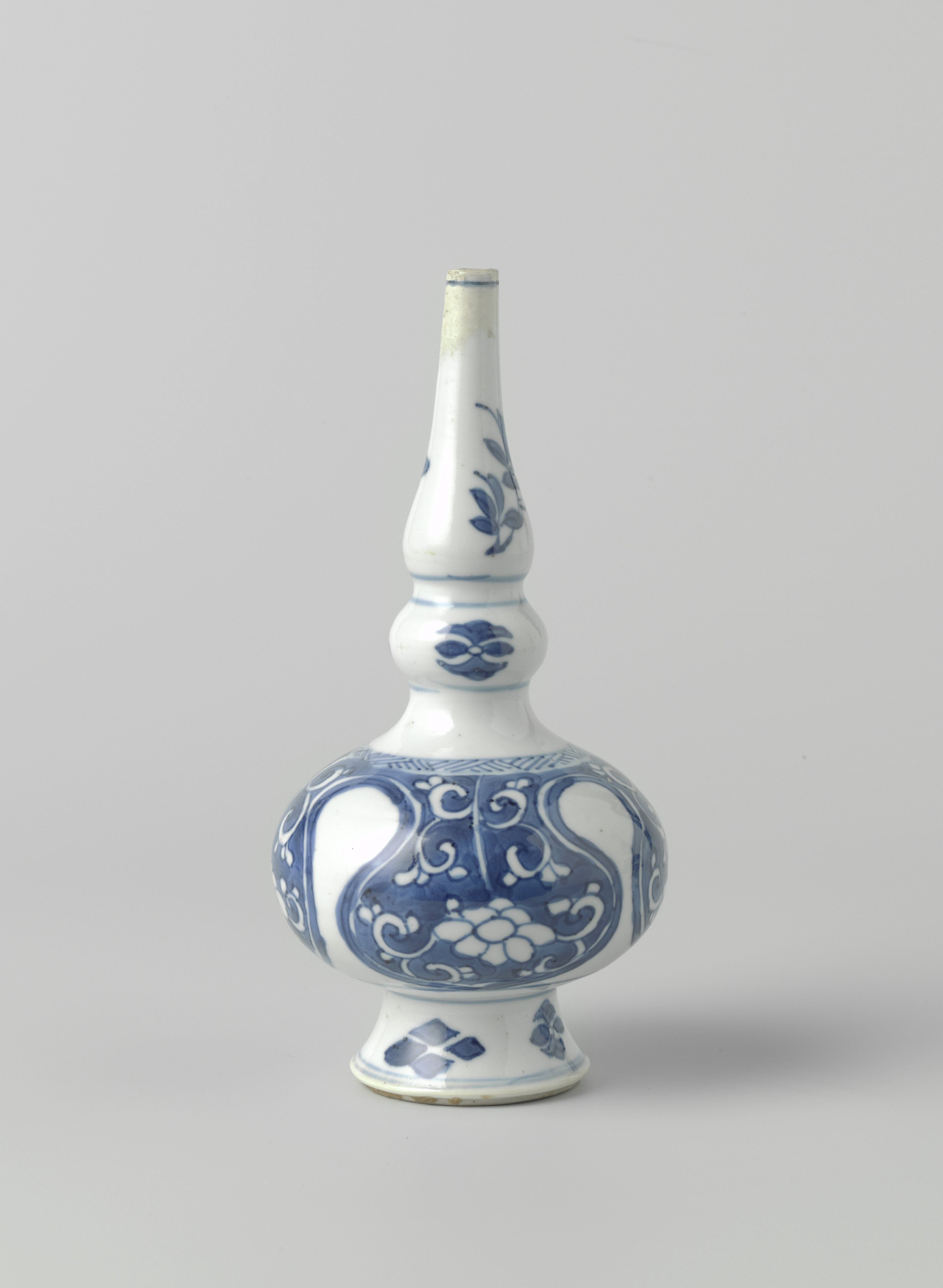 Rosewater sprinkler or bottle vase with  floral scrolls in reserve in lambrequins