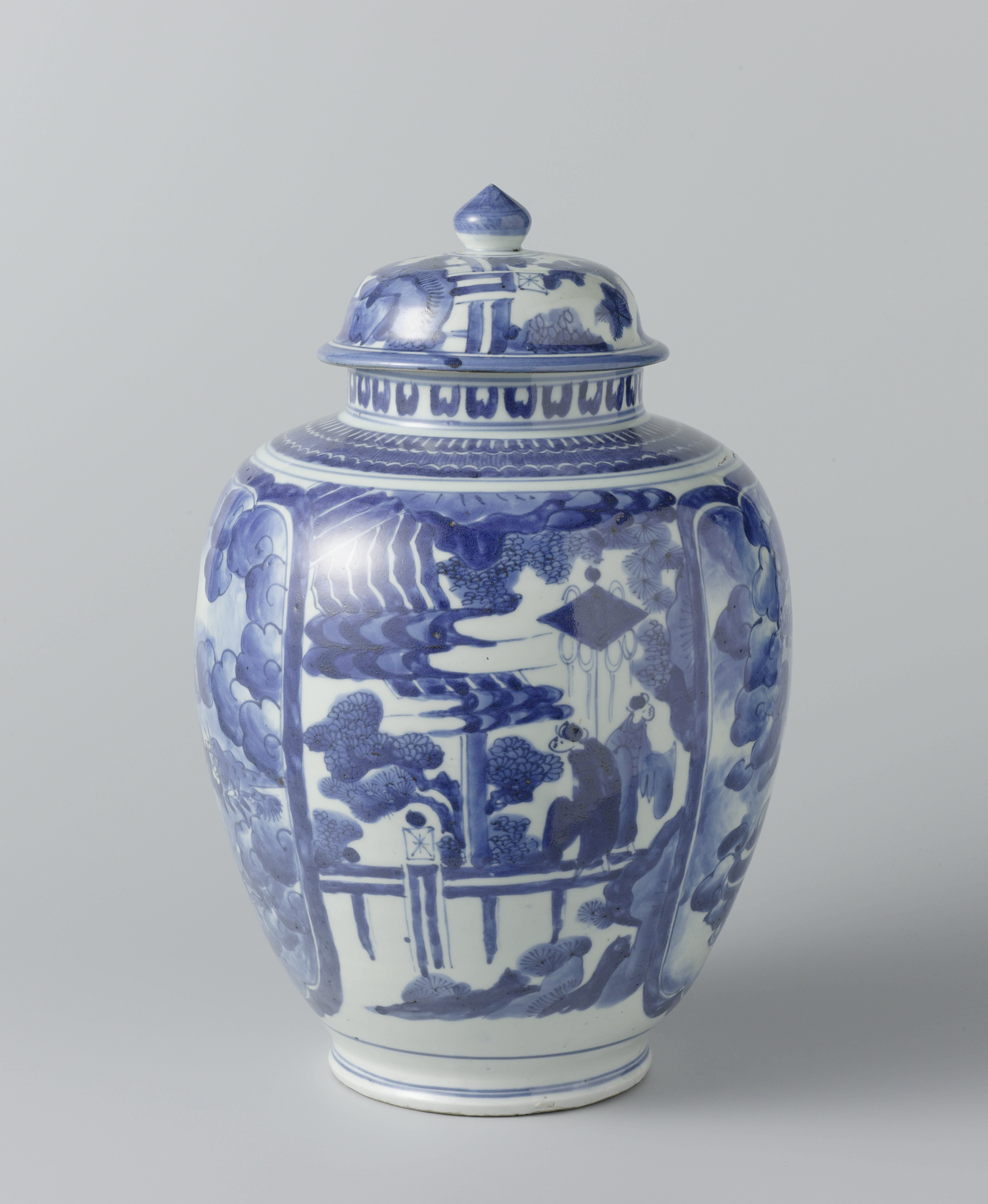 Ovoid covered jar with figures in a landscape and panels with dragons