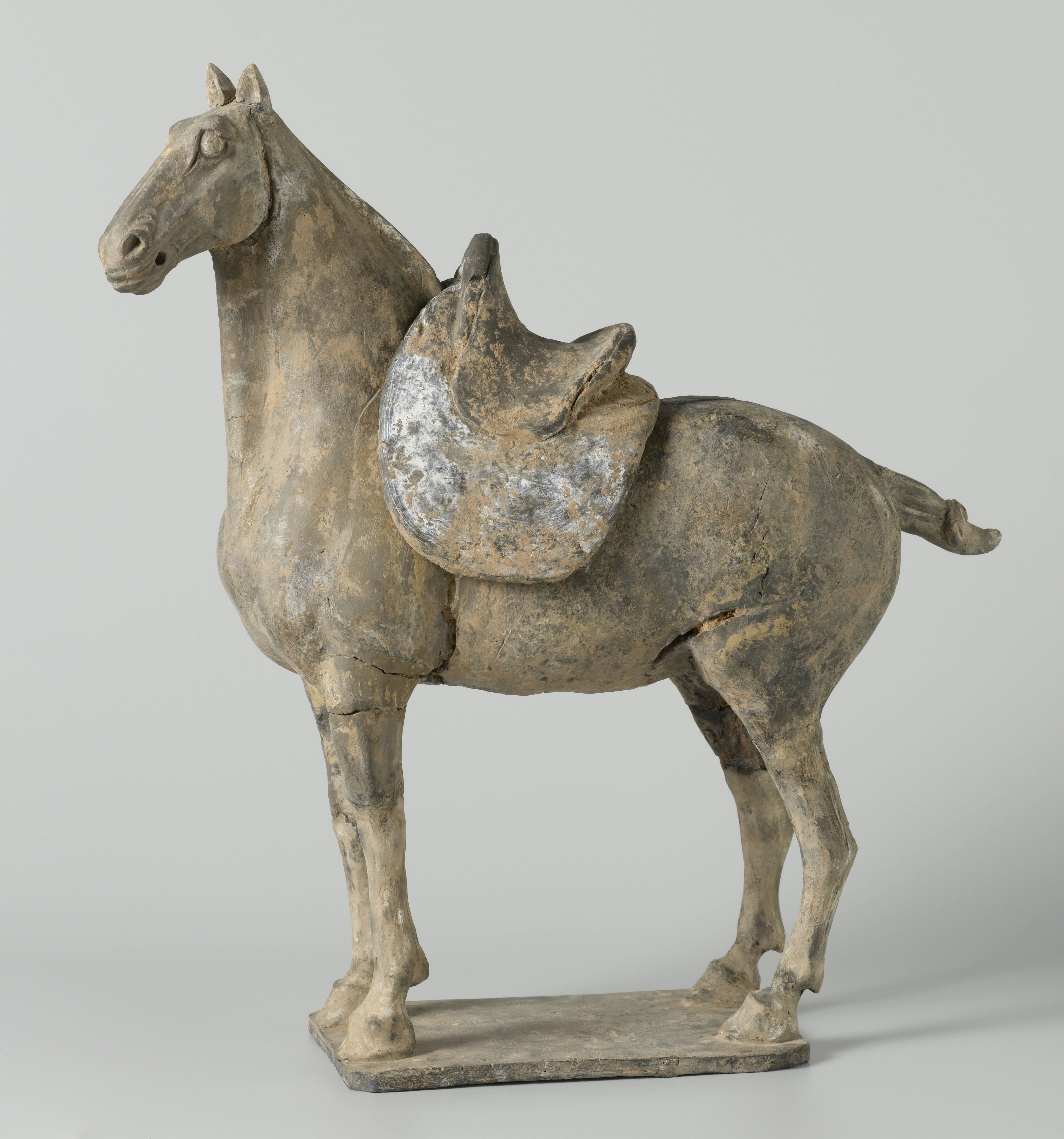 Graffiguur van een gazadeld paard