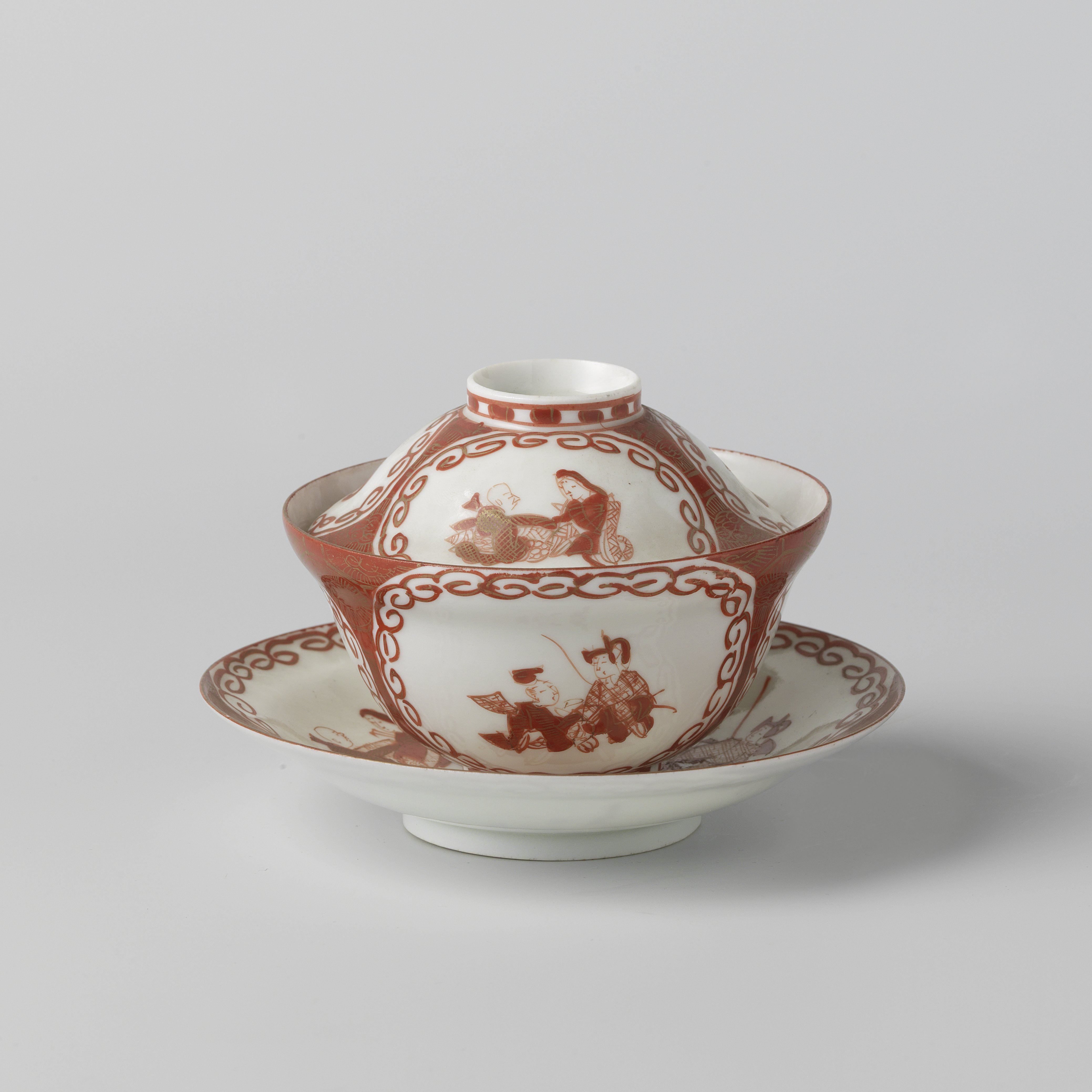 Covered cup and saucer with three panels with two seated figures