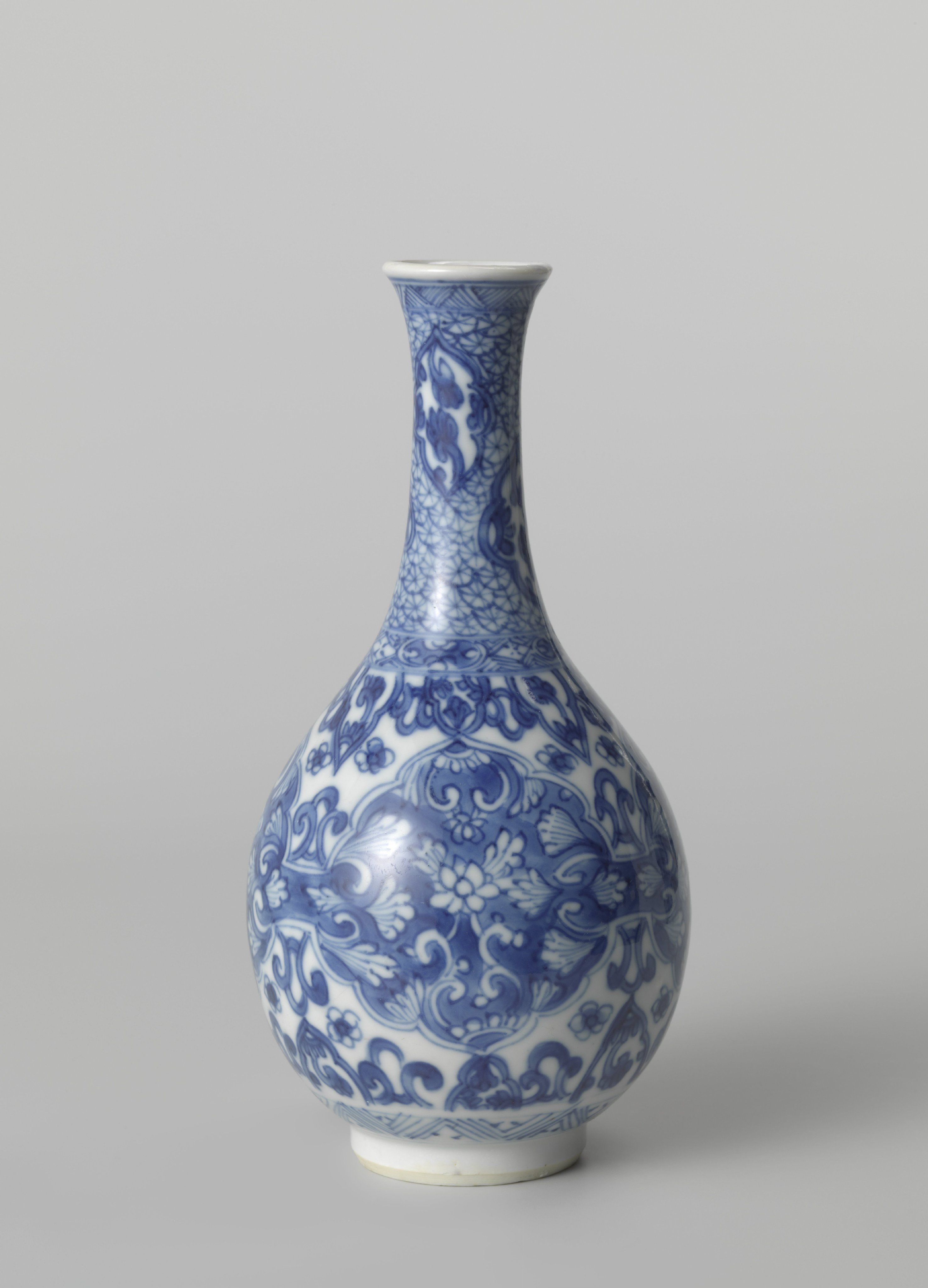 Pear-shaped bottle vase with floral scrolls