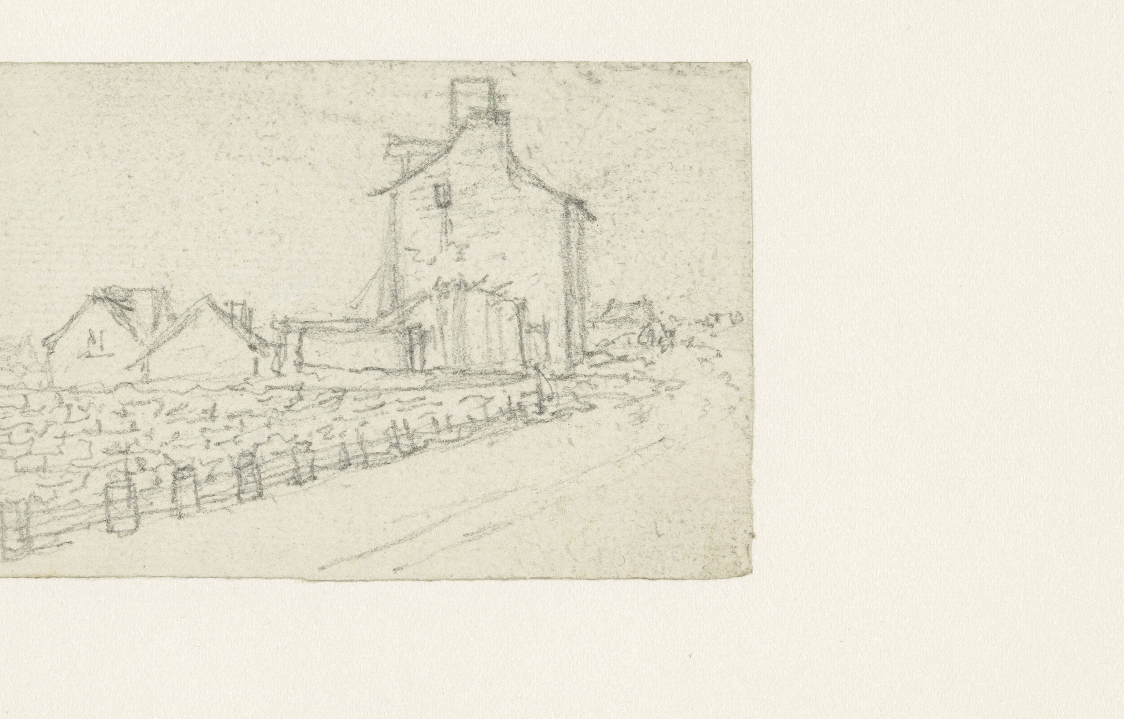 Weg met muur erlangs leidend naar een huis