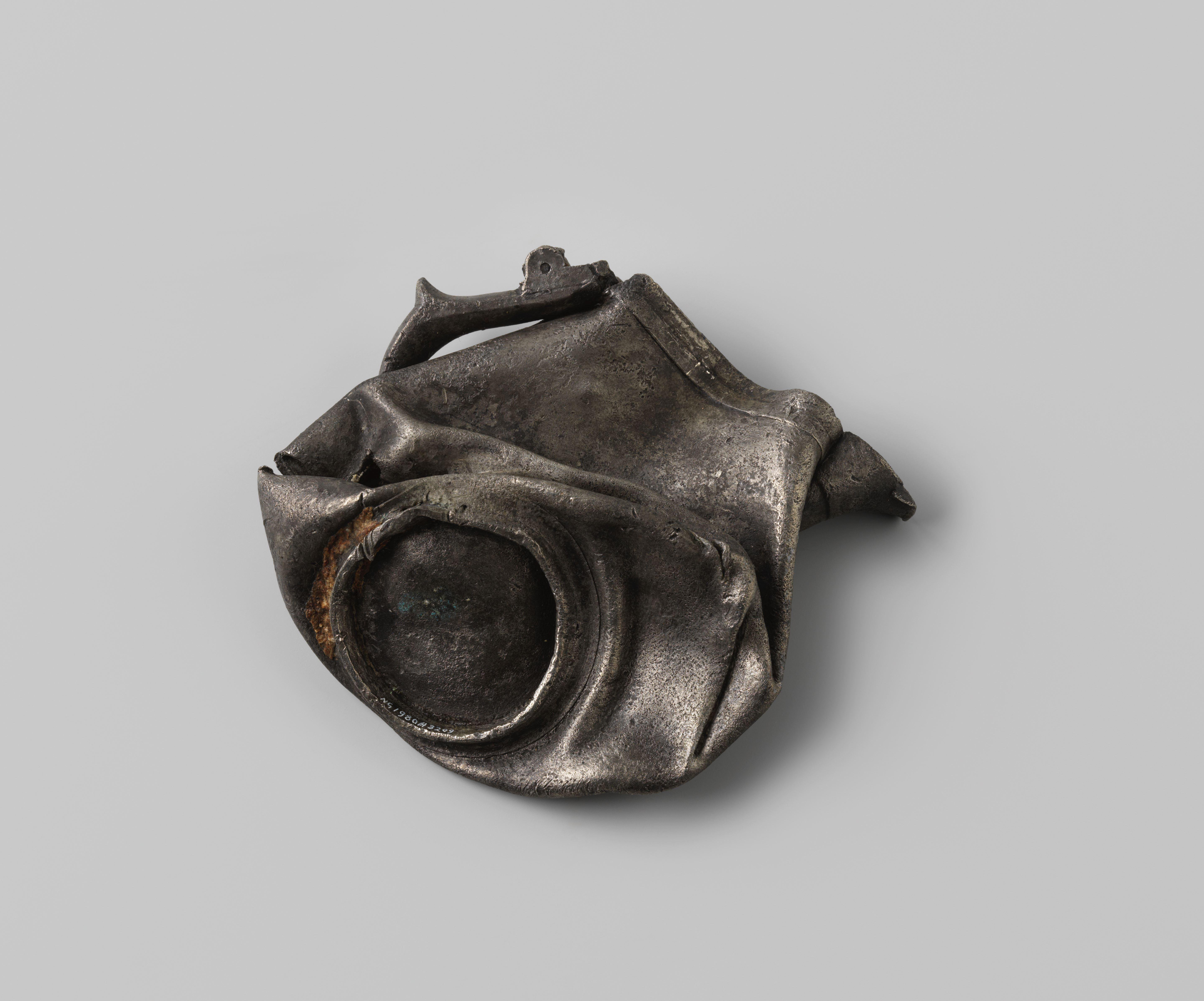 Squashed pewter jug from the wreck of the Dutch East Indiaman Hollandia