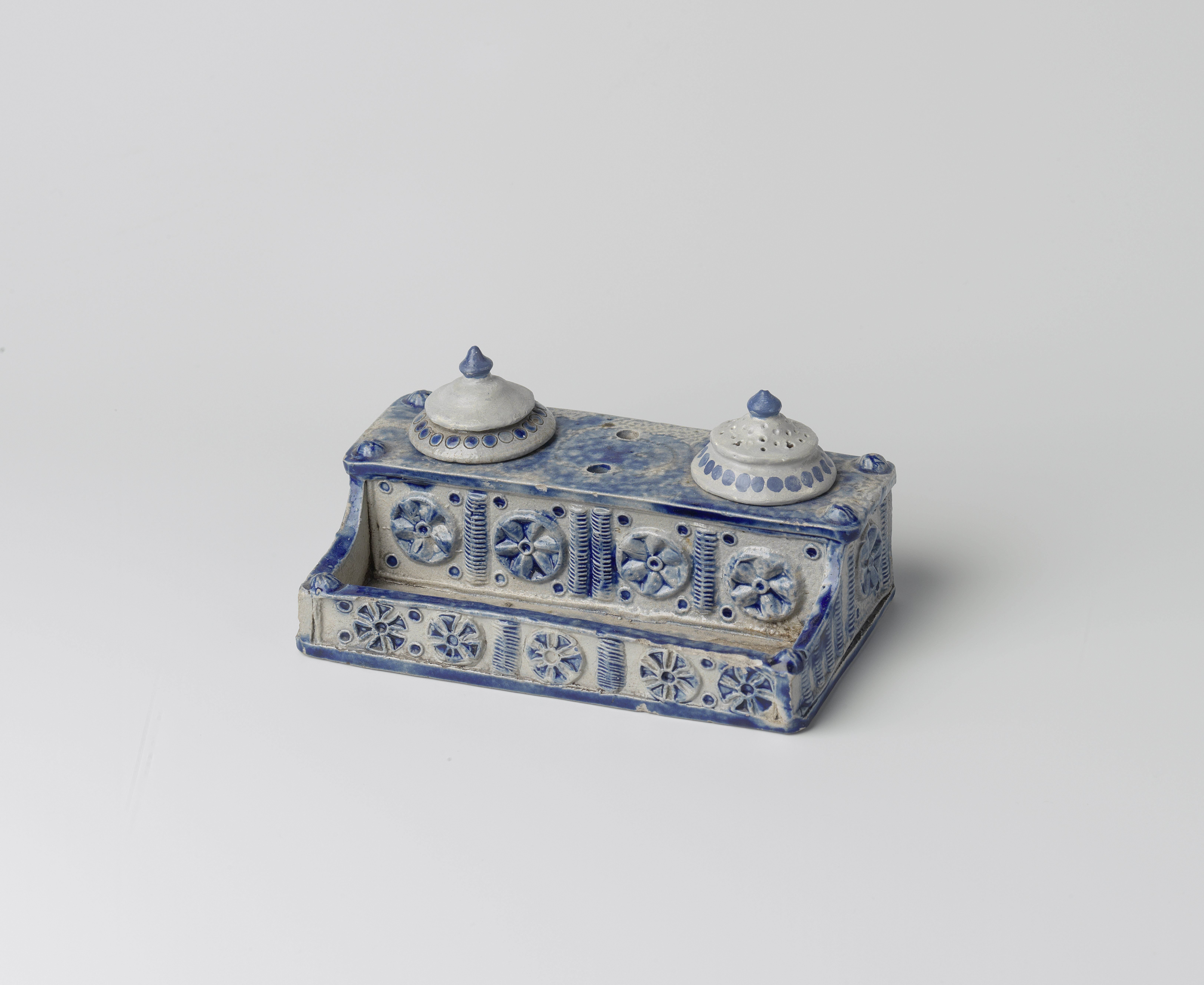 Ink stand with flower roundels