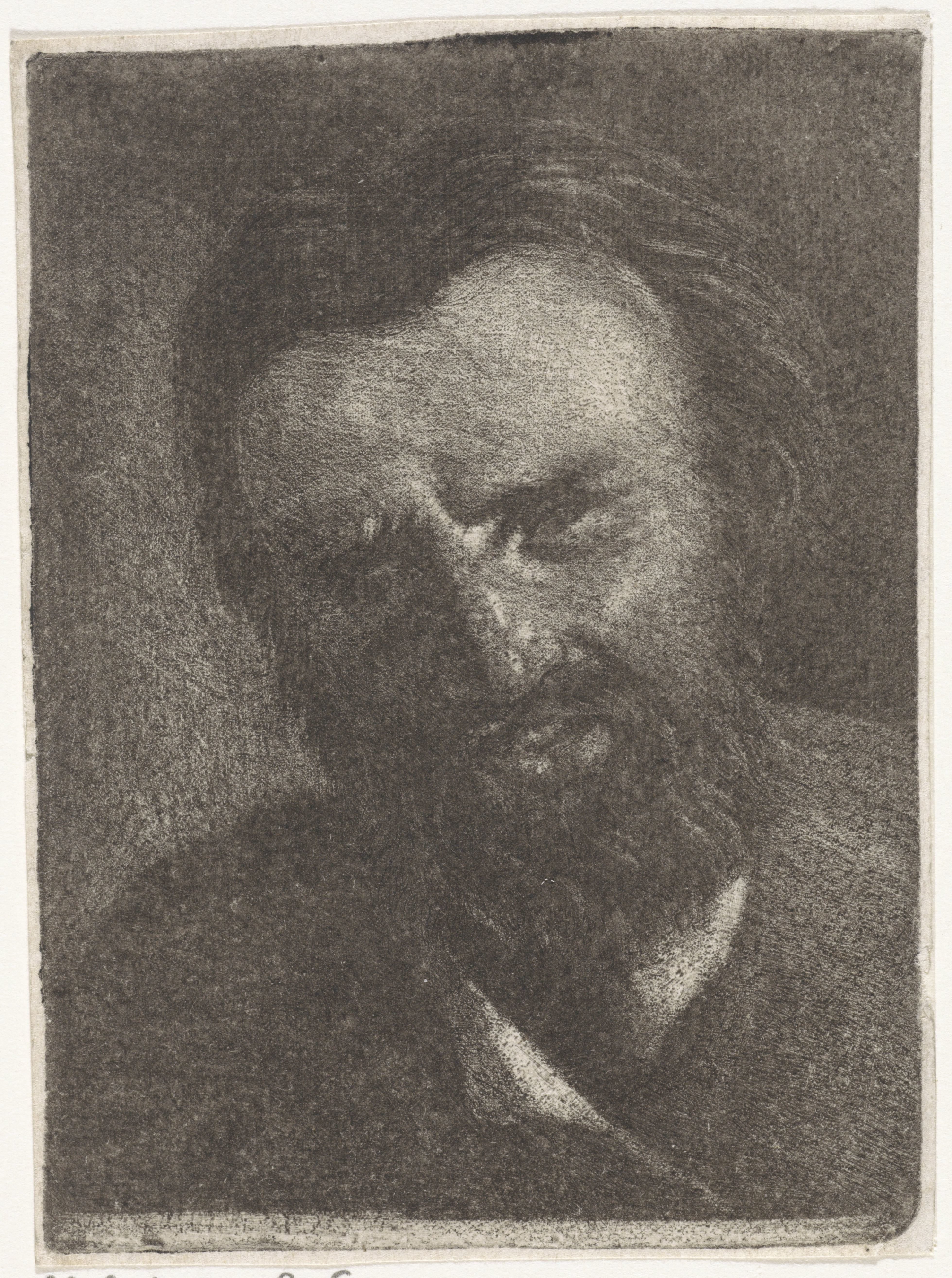 Kop van een man met een korte baard