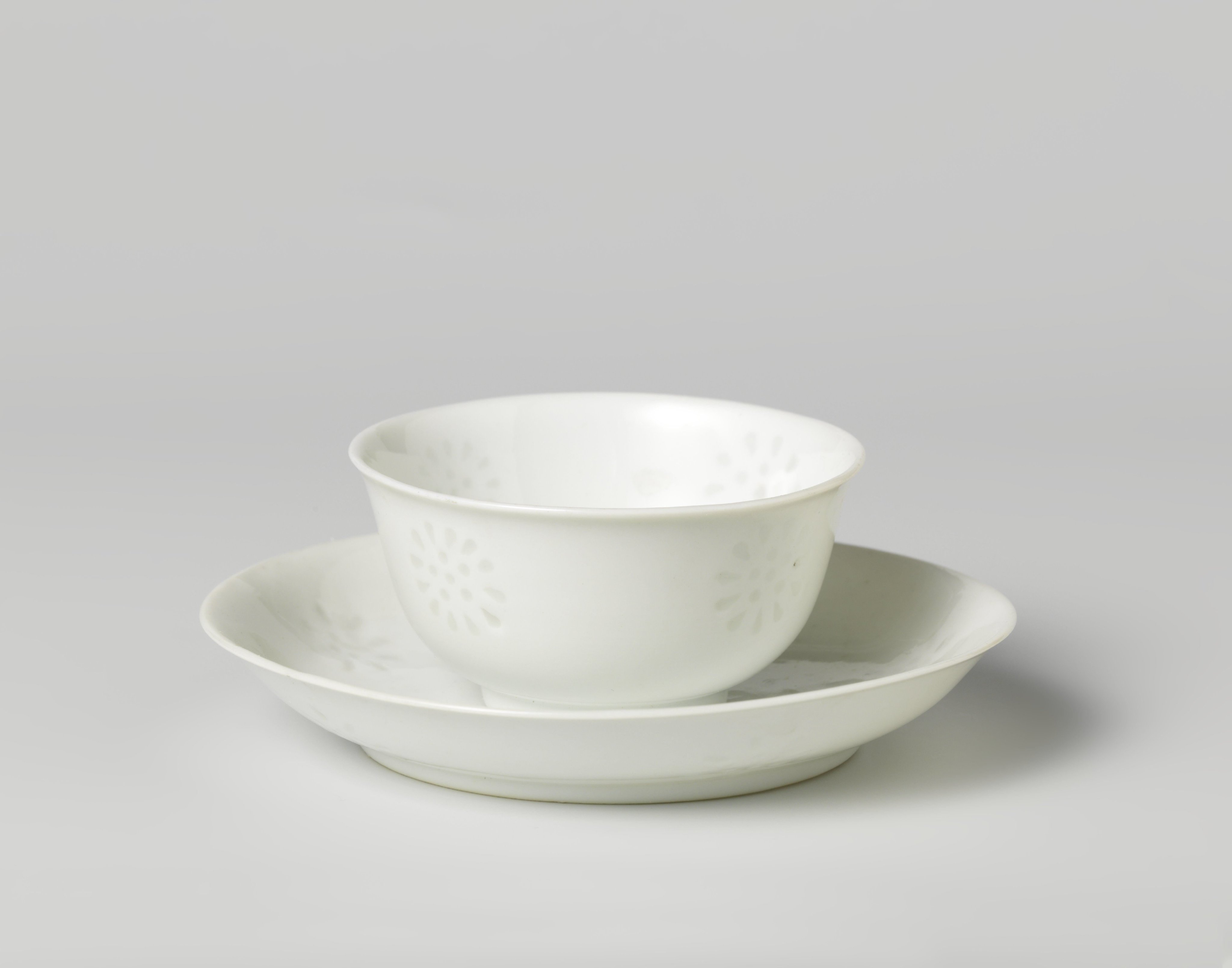Cup and saucer with translucents rice-grain roundels