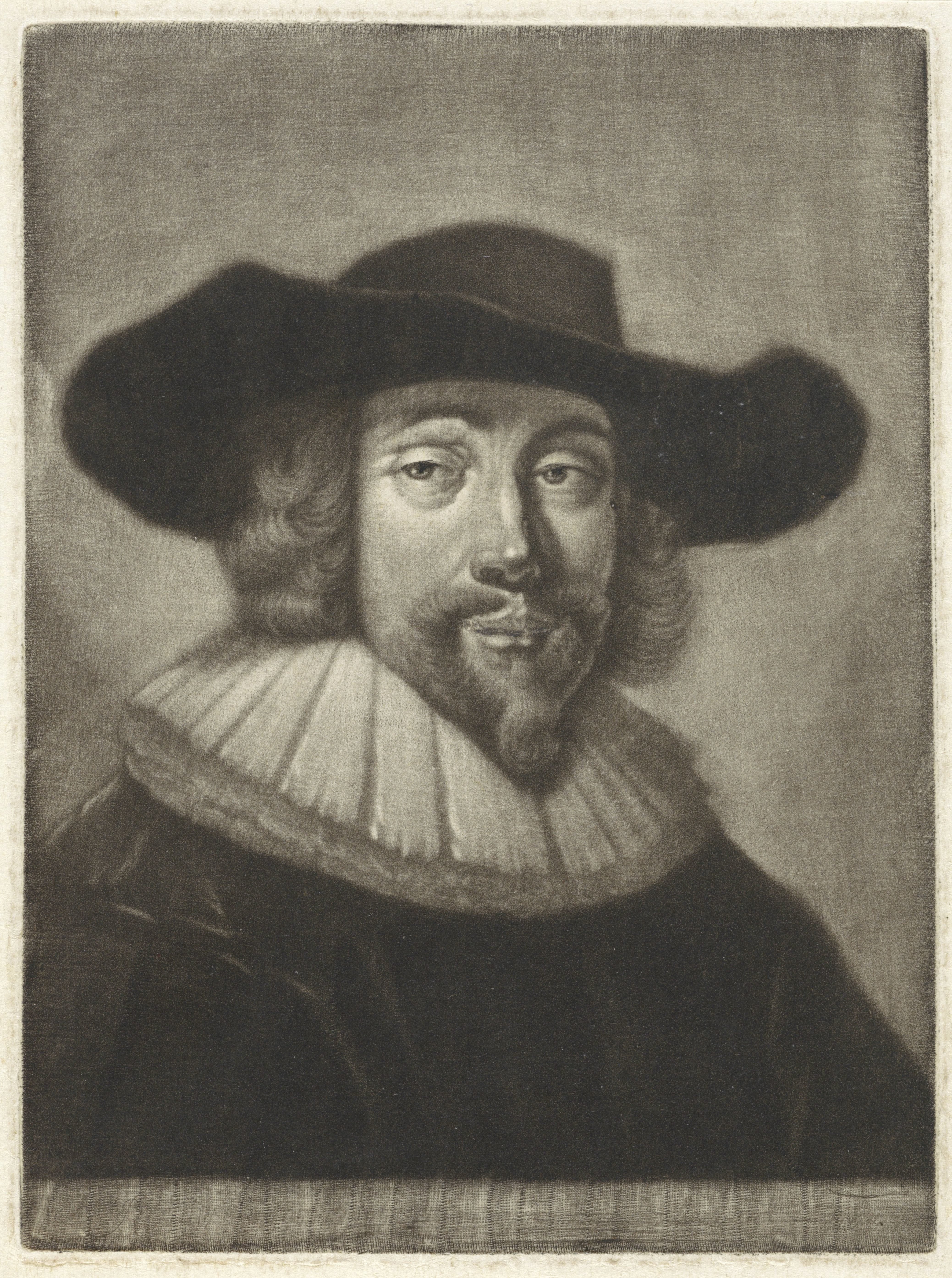Portret van een man met een hoed en kraag