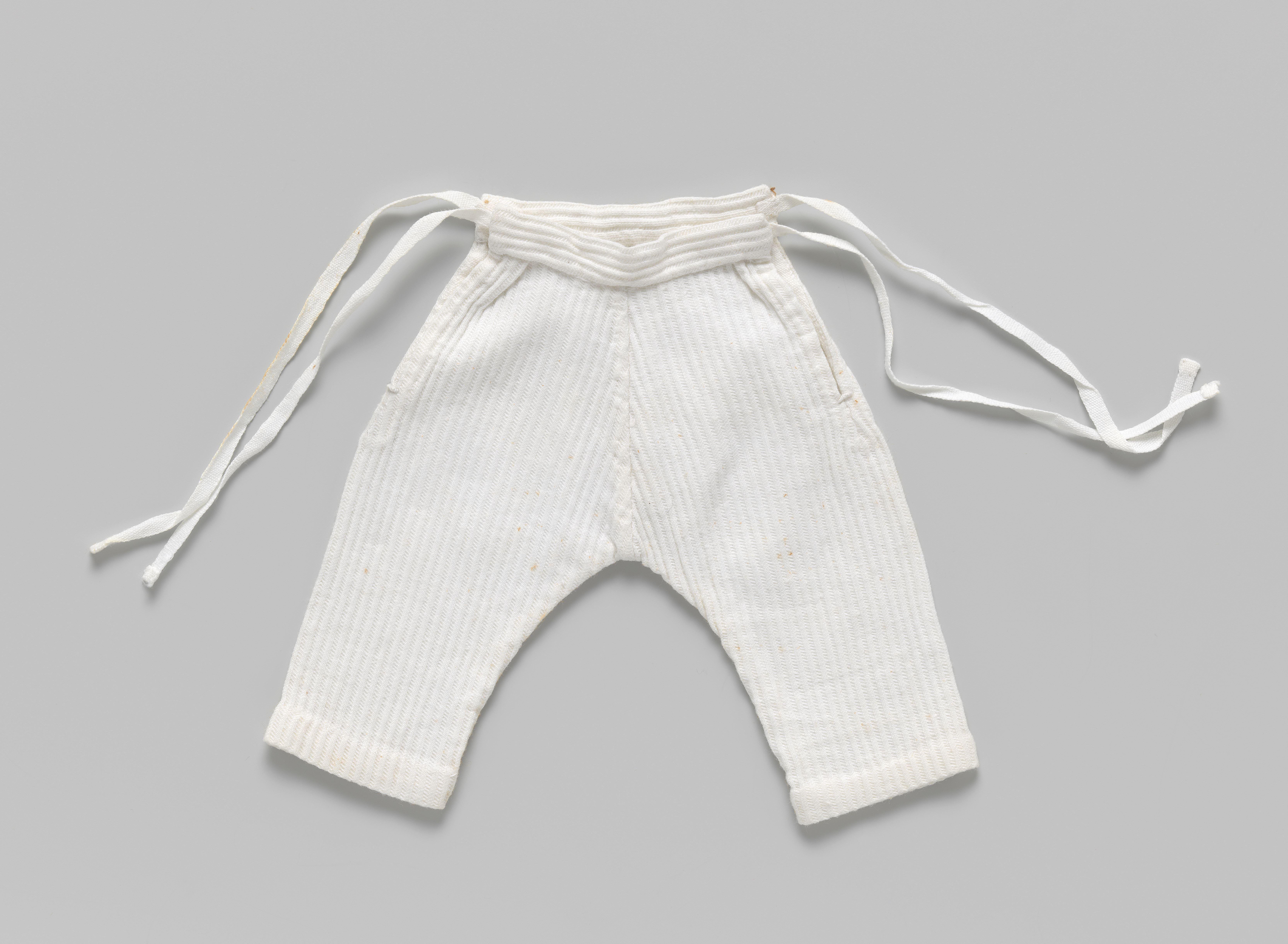 Broek van piqué, met lange pijpen en met banden