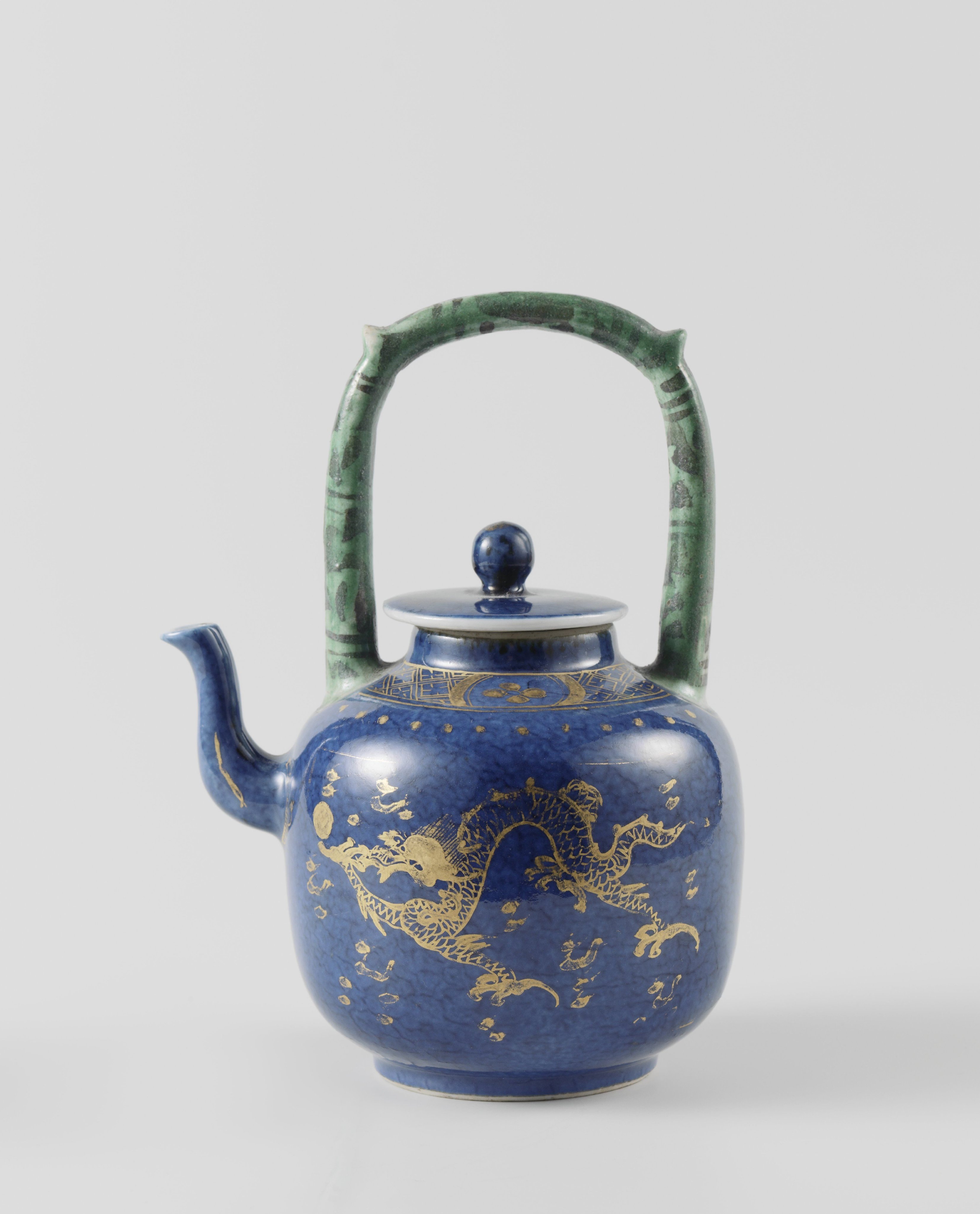 Teapot with powder blue and pearl chasing dragons in gold