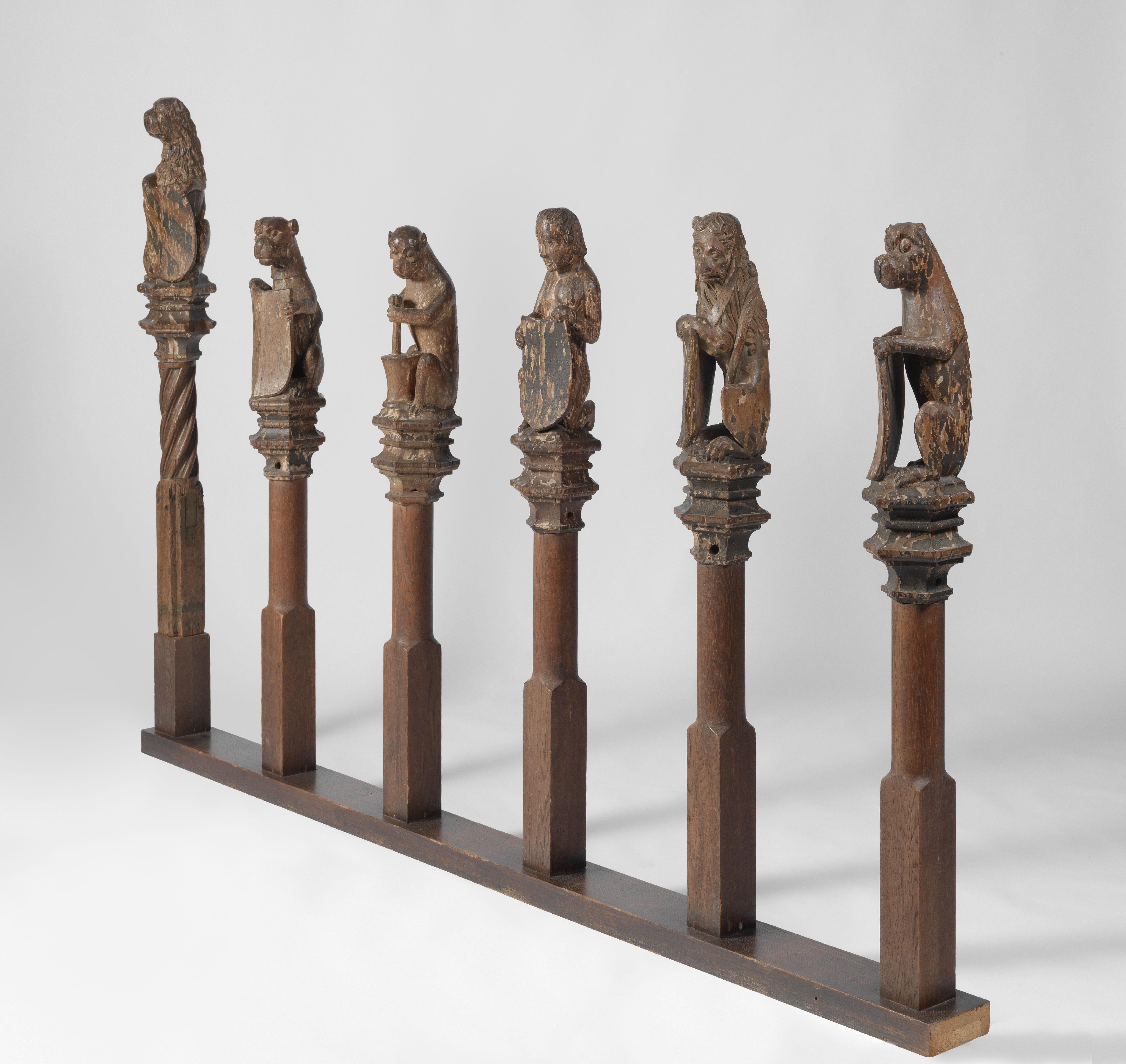 Thirteen Figures, Mostly Supporters of Escutcheons, from the Top of a Balustrade and the Backrest of the Stadholder’s Chair in the Rolzaal in the Hof van Holland, The Hague