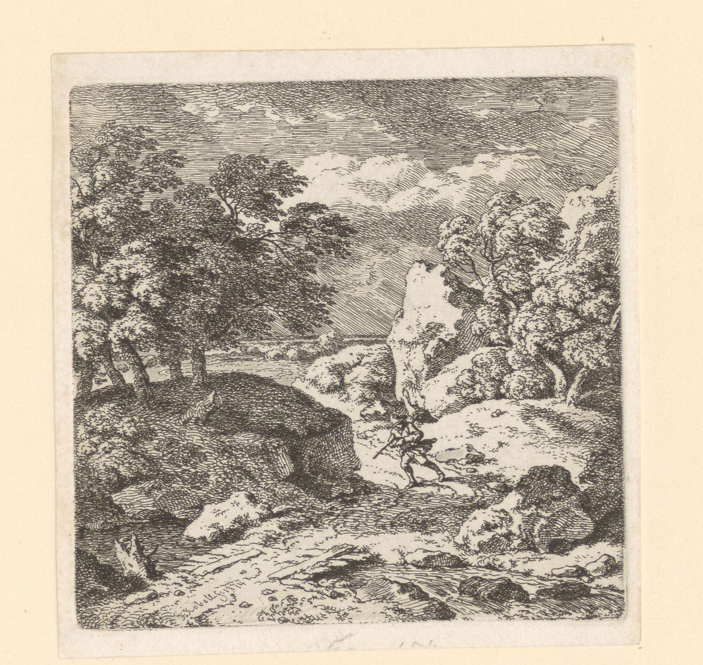 Rotsachtig landschap met figuur op een landweg