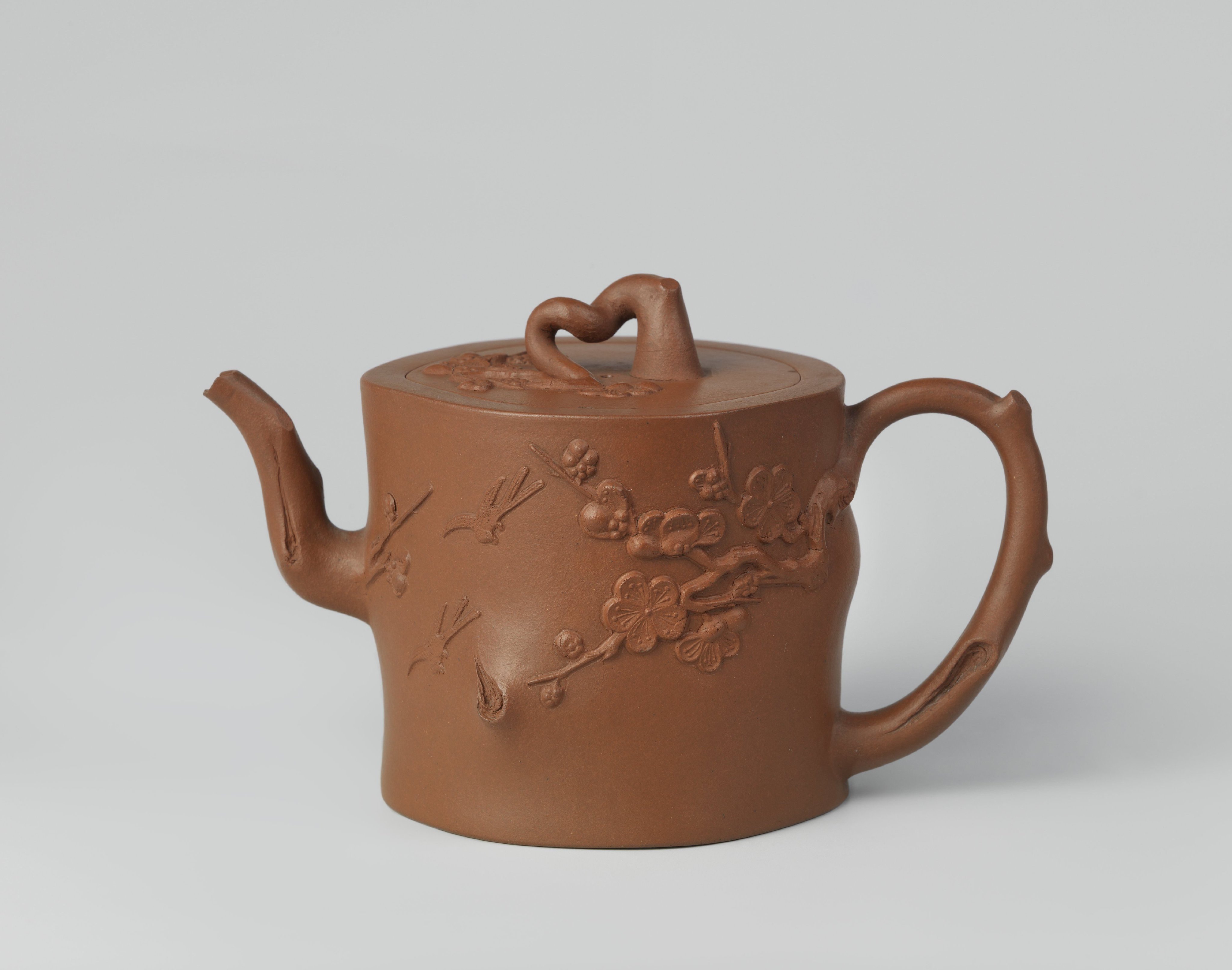 Teapot with prunus sprays, birds and a butterfly
