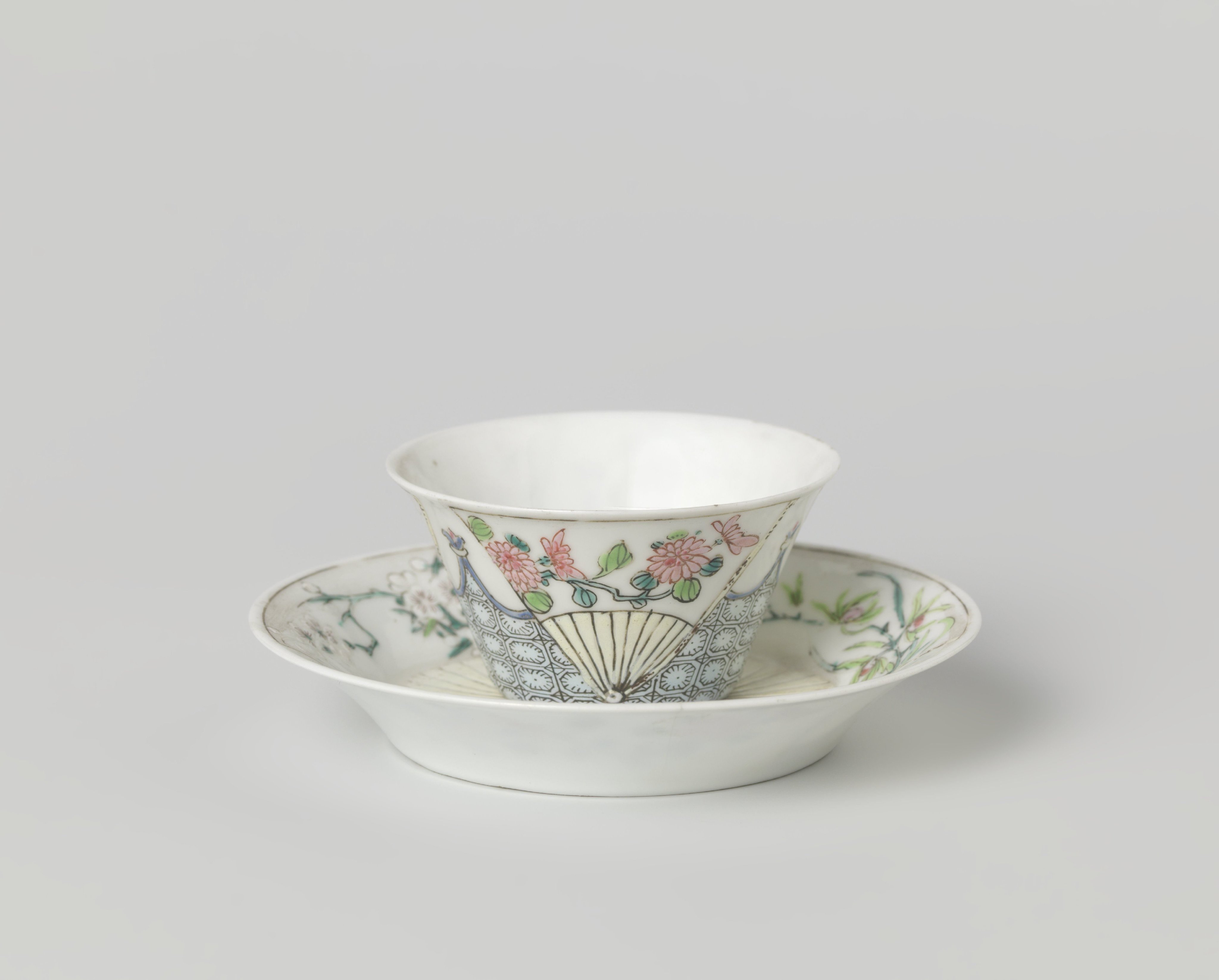 Cup and saucer with three fans with flower sprays