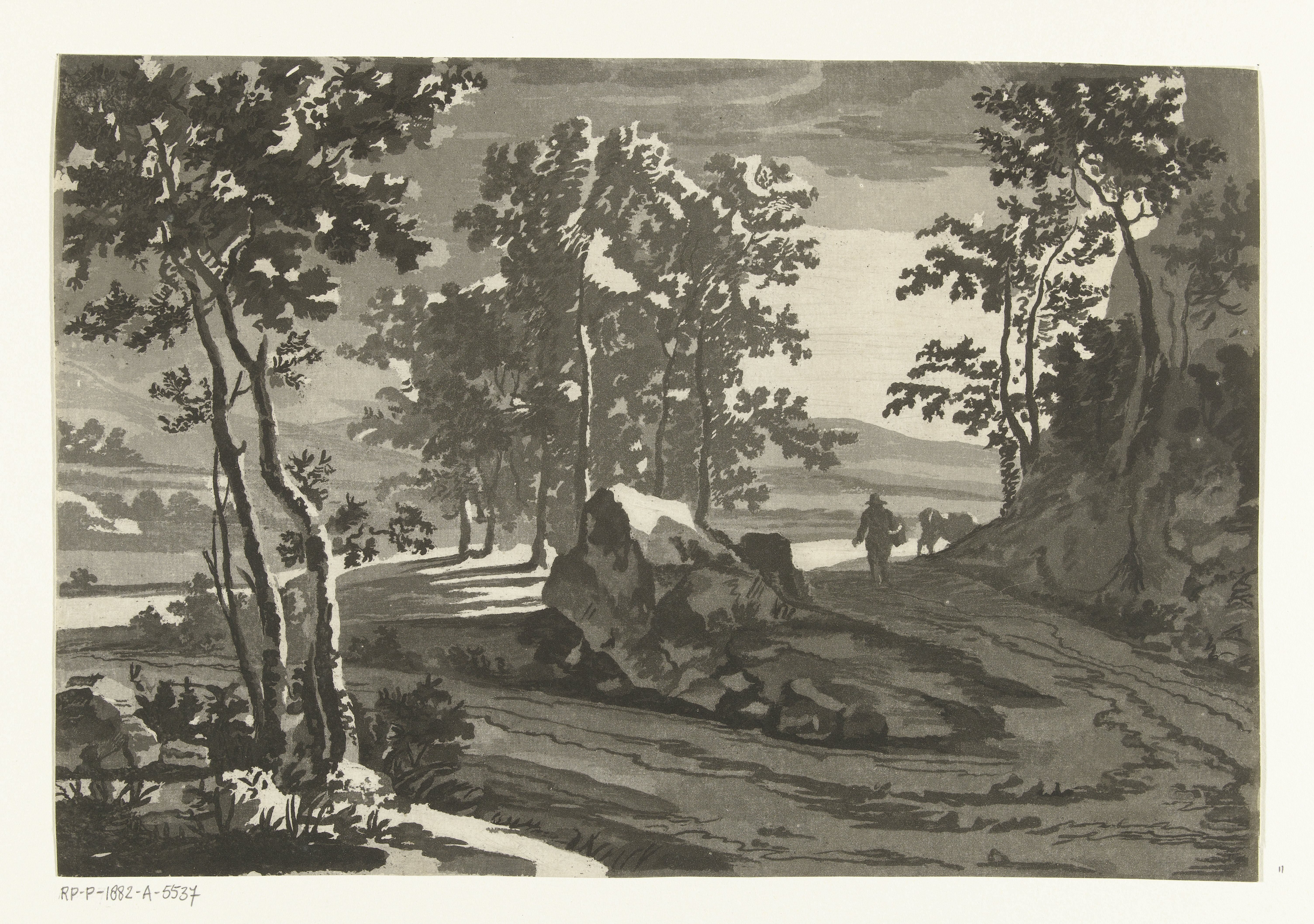 Boomrijk landschap met veedrijver