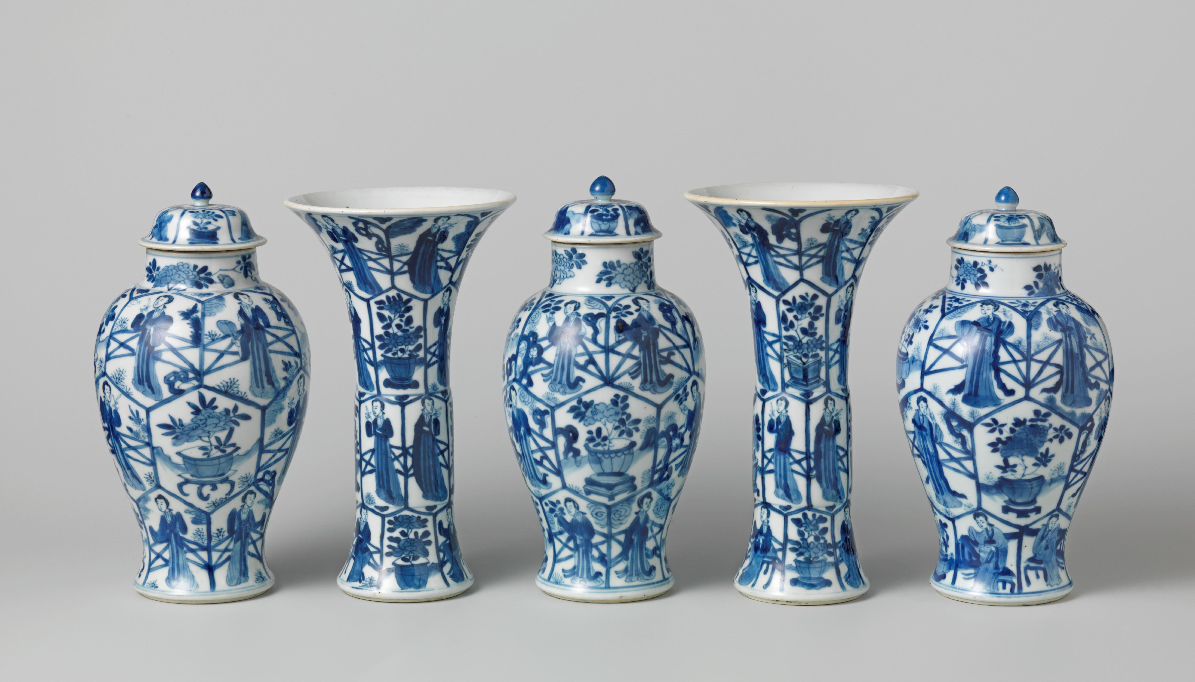 Dish with a standing woman, and a garniture consisting of two vases and three pots