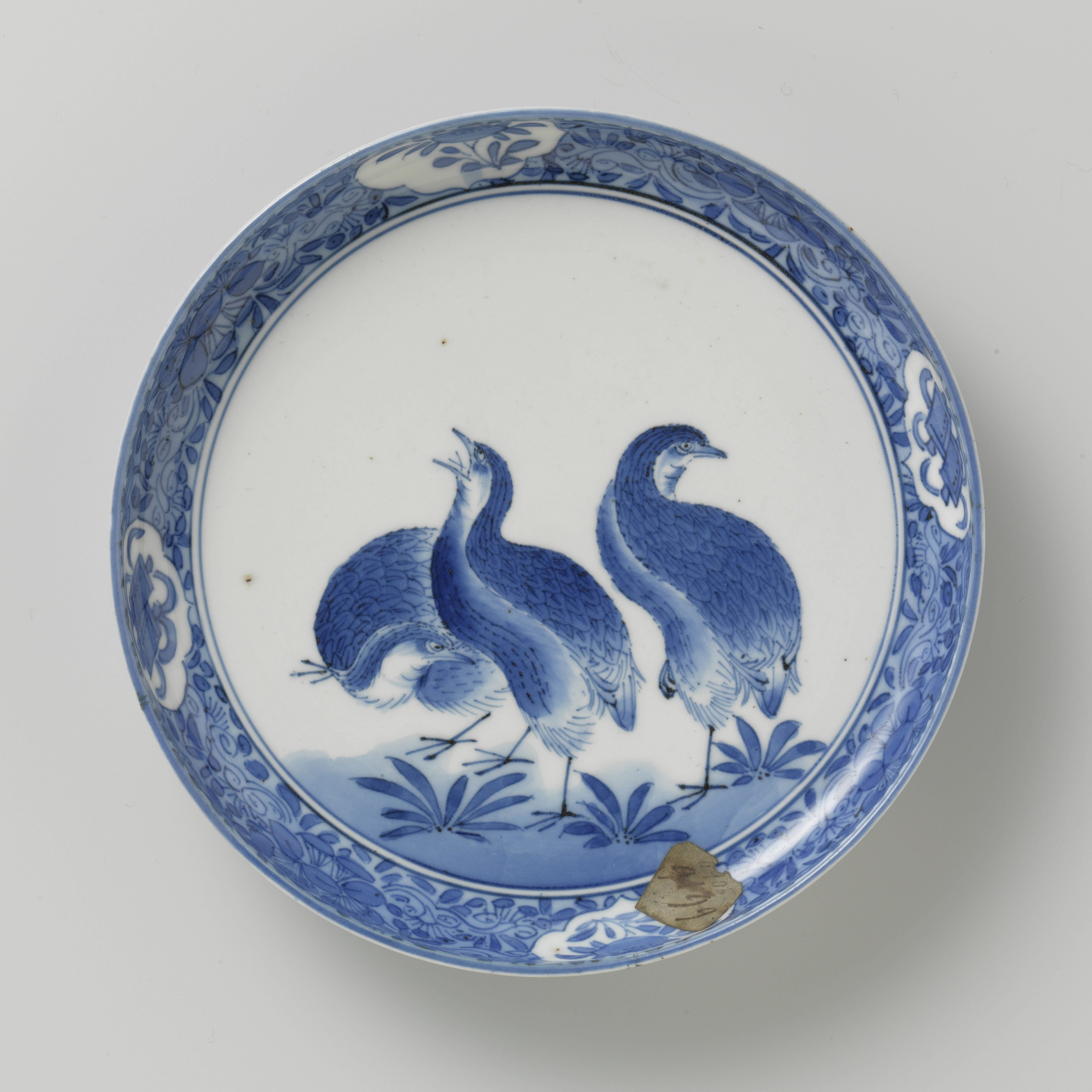 Saucer-dish with three quails