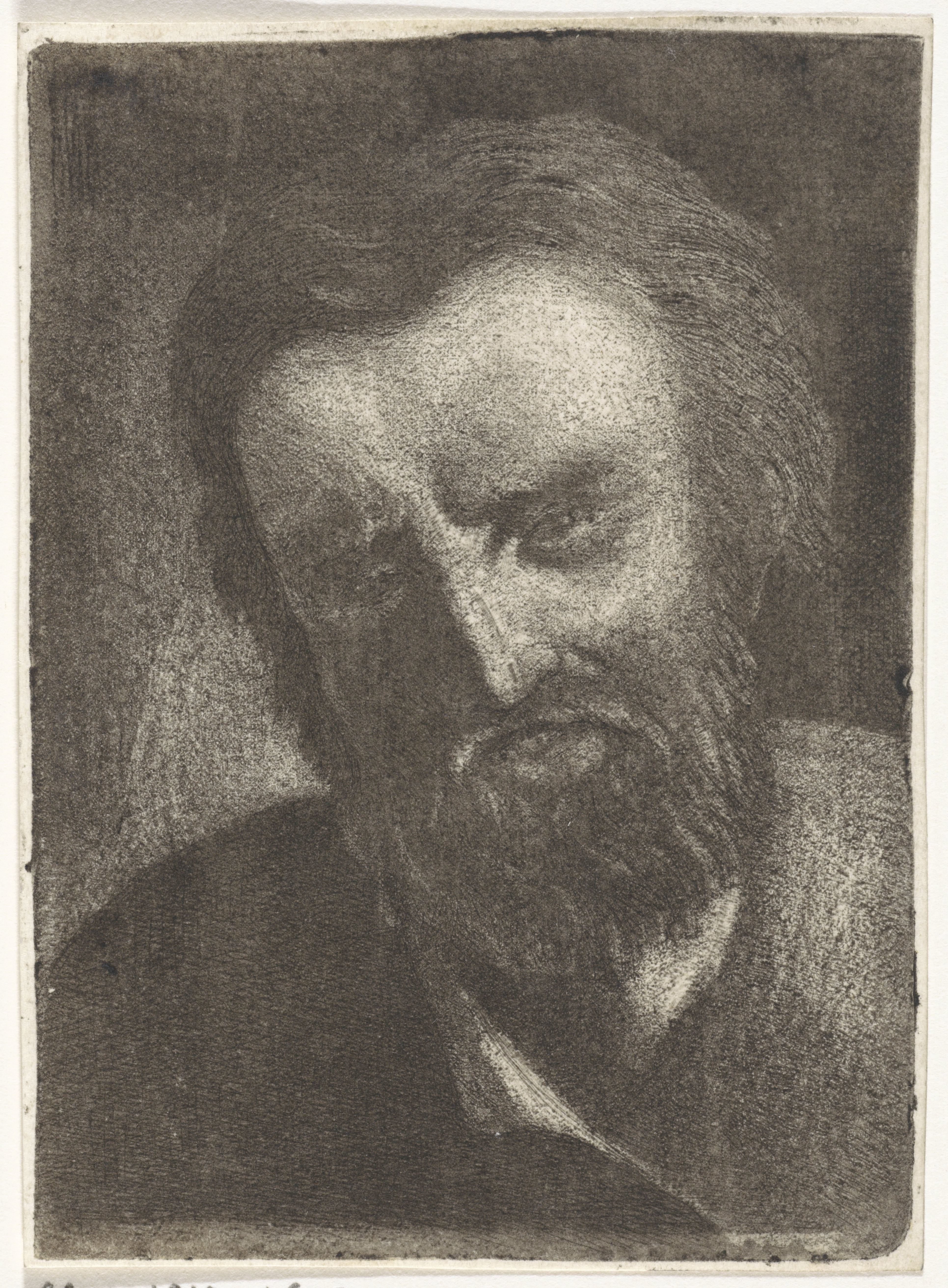 Kop van een man met een korte baard