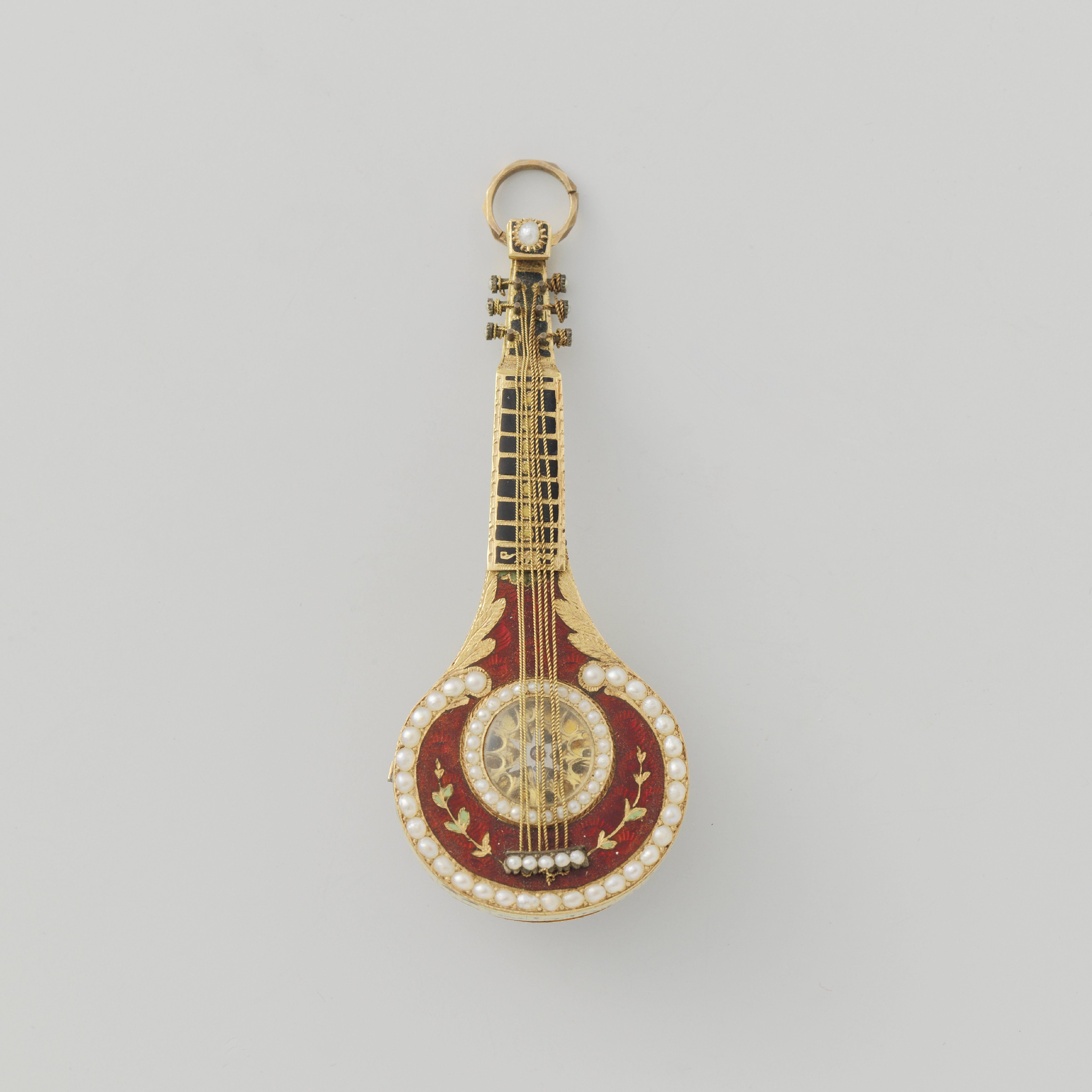 Horloge in de vorm van een mandoline