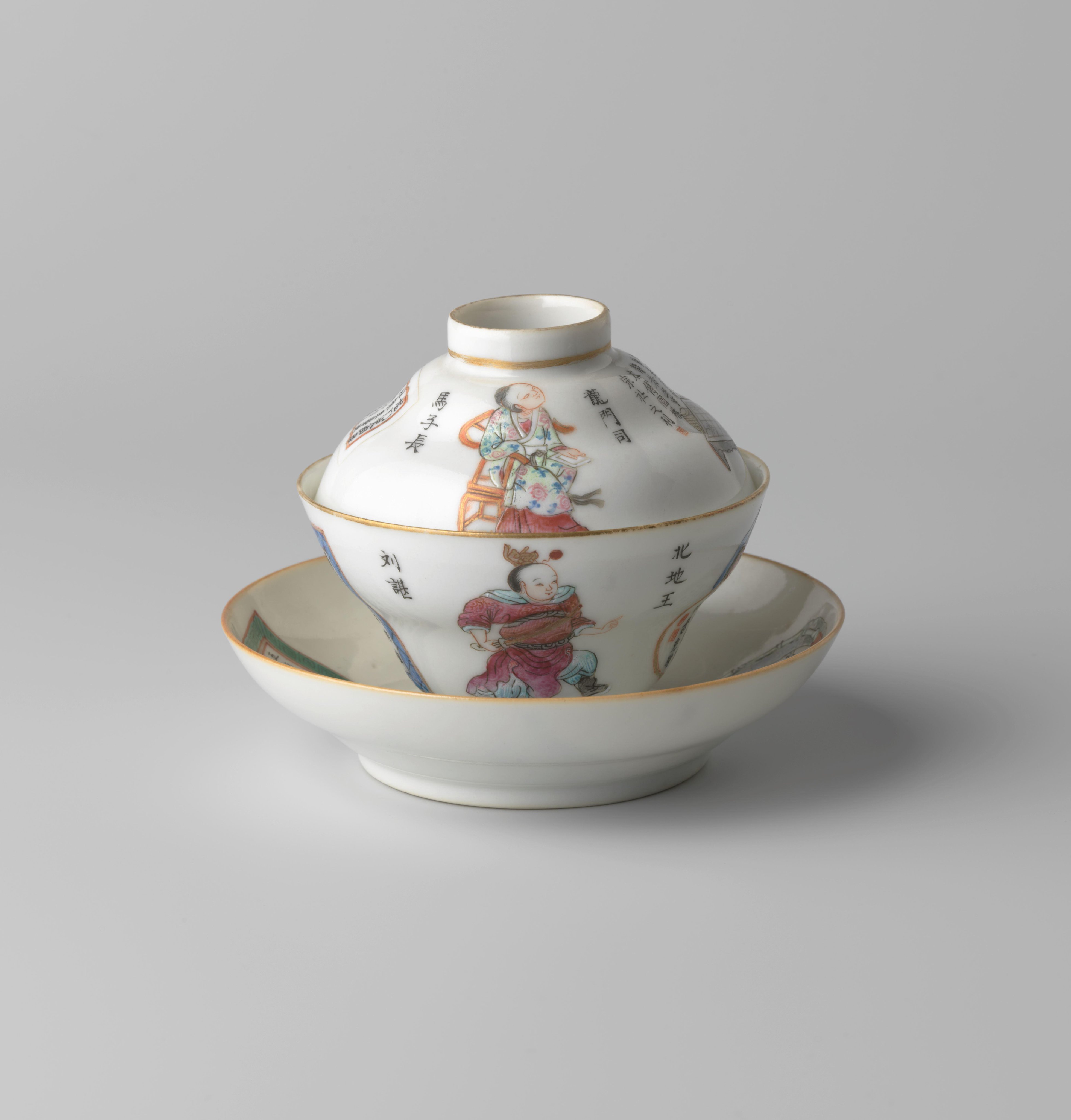 Covered cup and saucer with figures, a go-bord and inscriptions