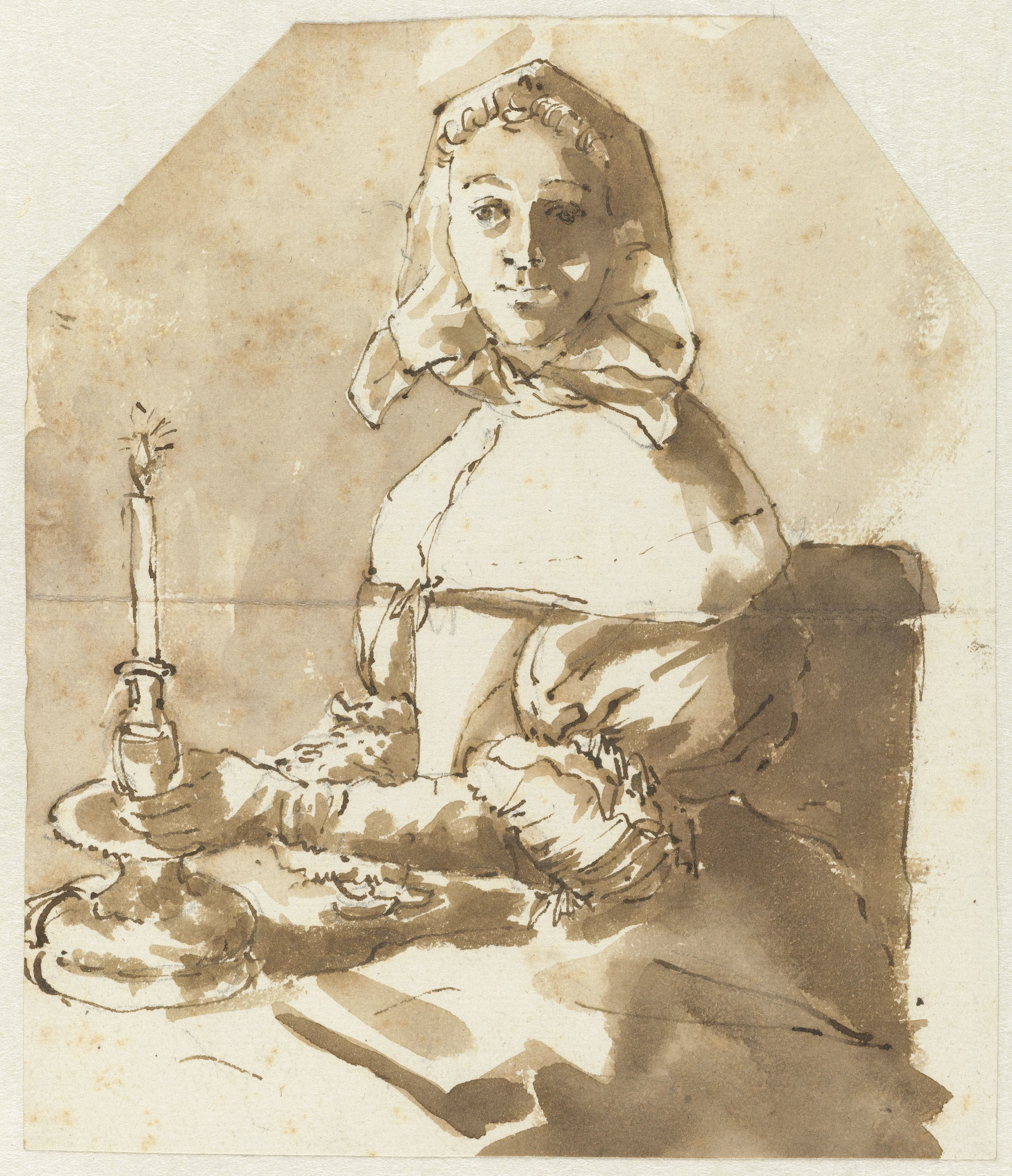 Jonge vrouw zittend aan tafel
