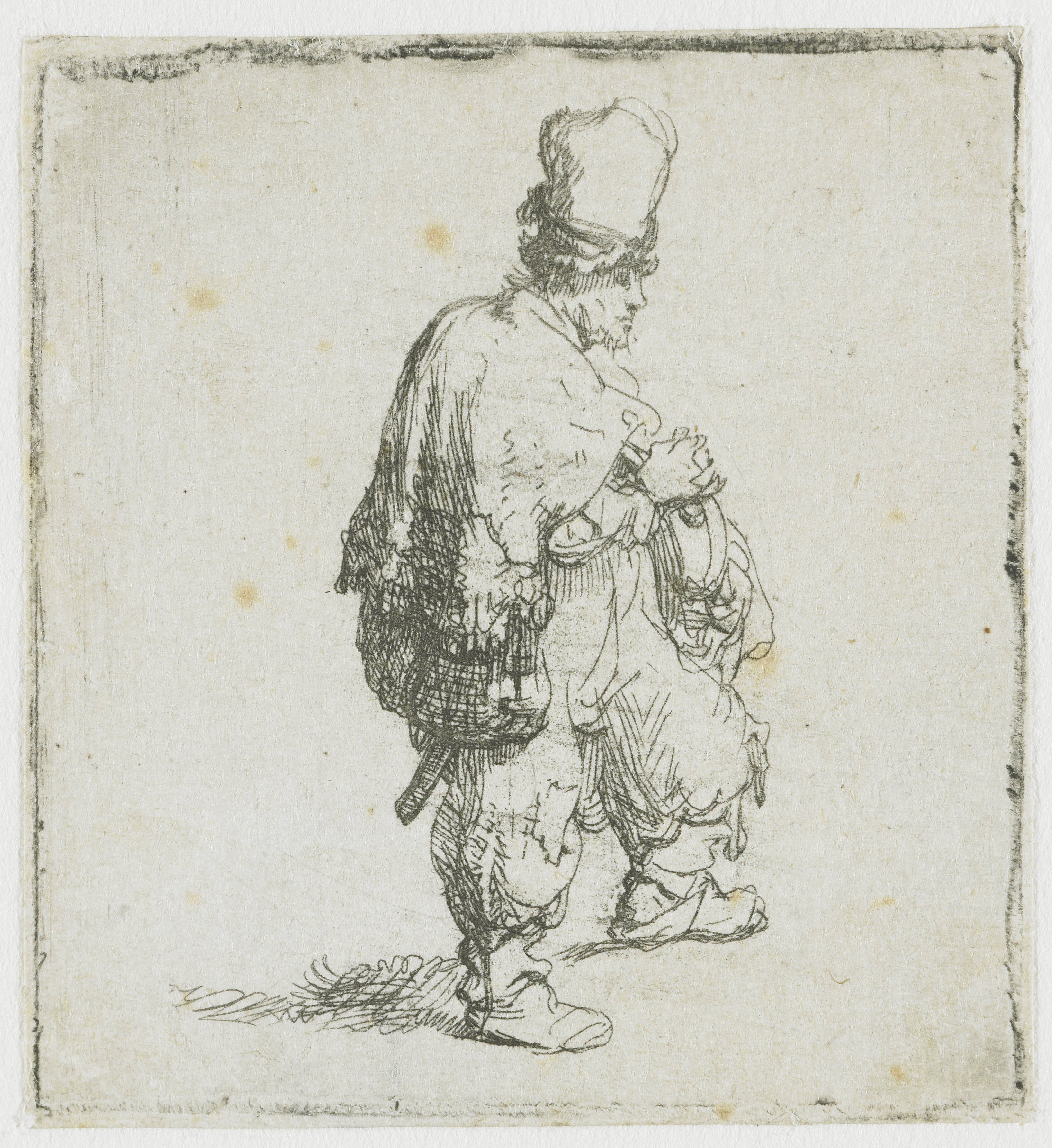 A standing hurdy-gurdy player