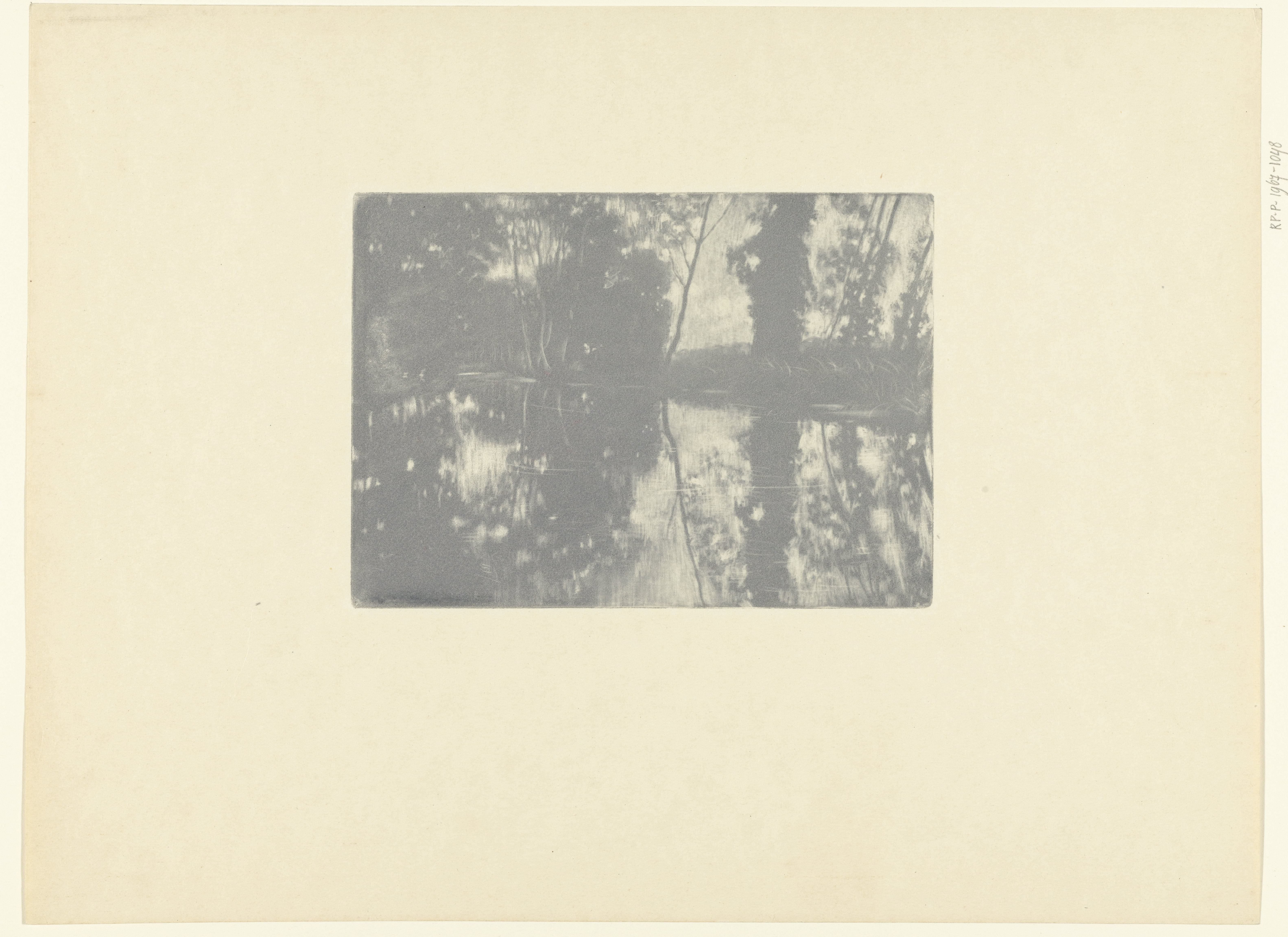 Landschap met bomen aan waterkant