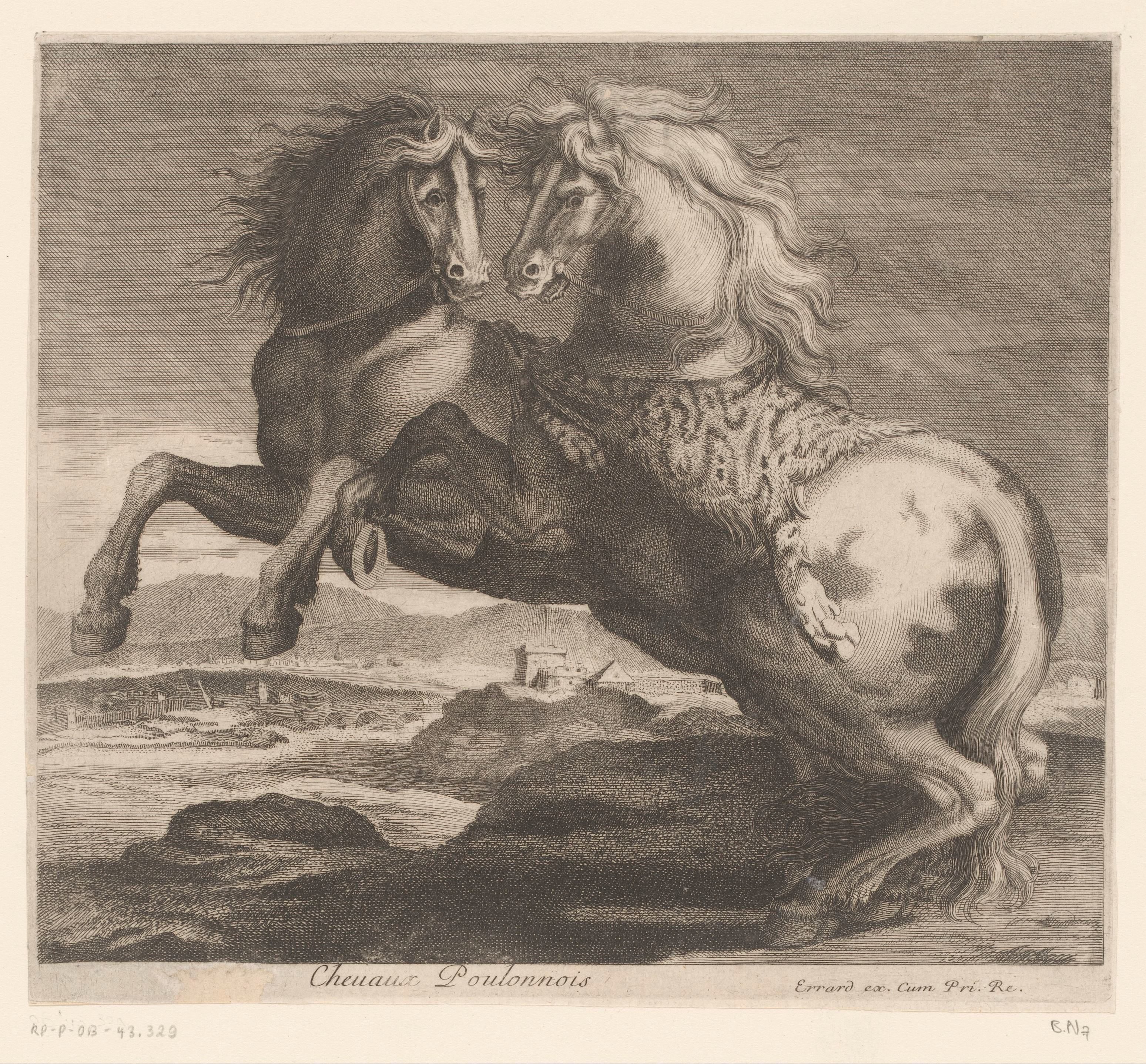 Steigerende paarden in een landschap