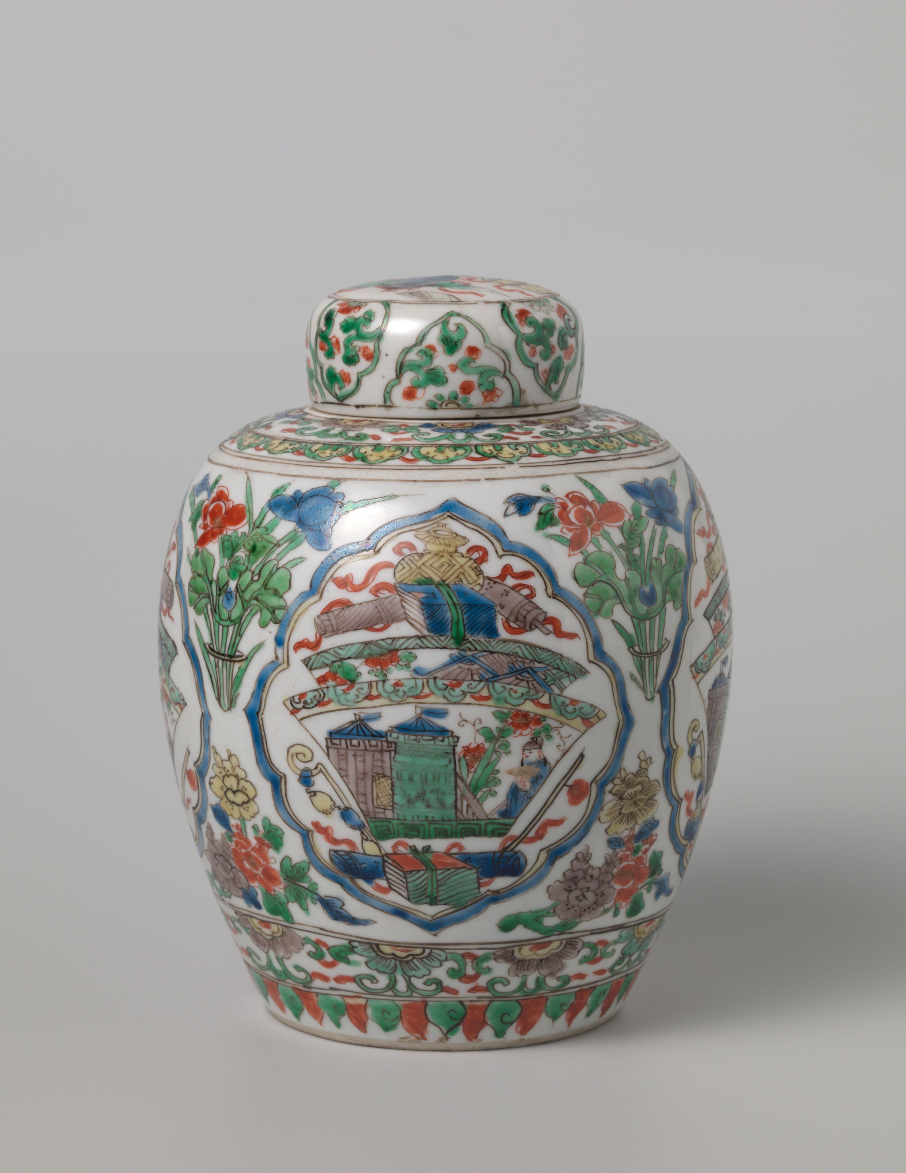 Covered, ovoid jar with antiquities and flower sprays
