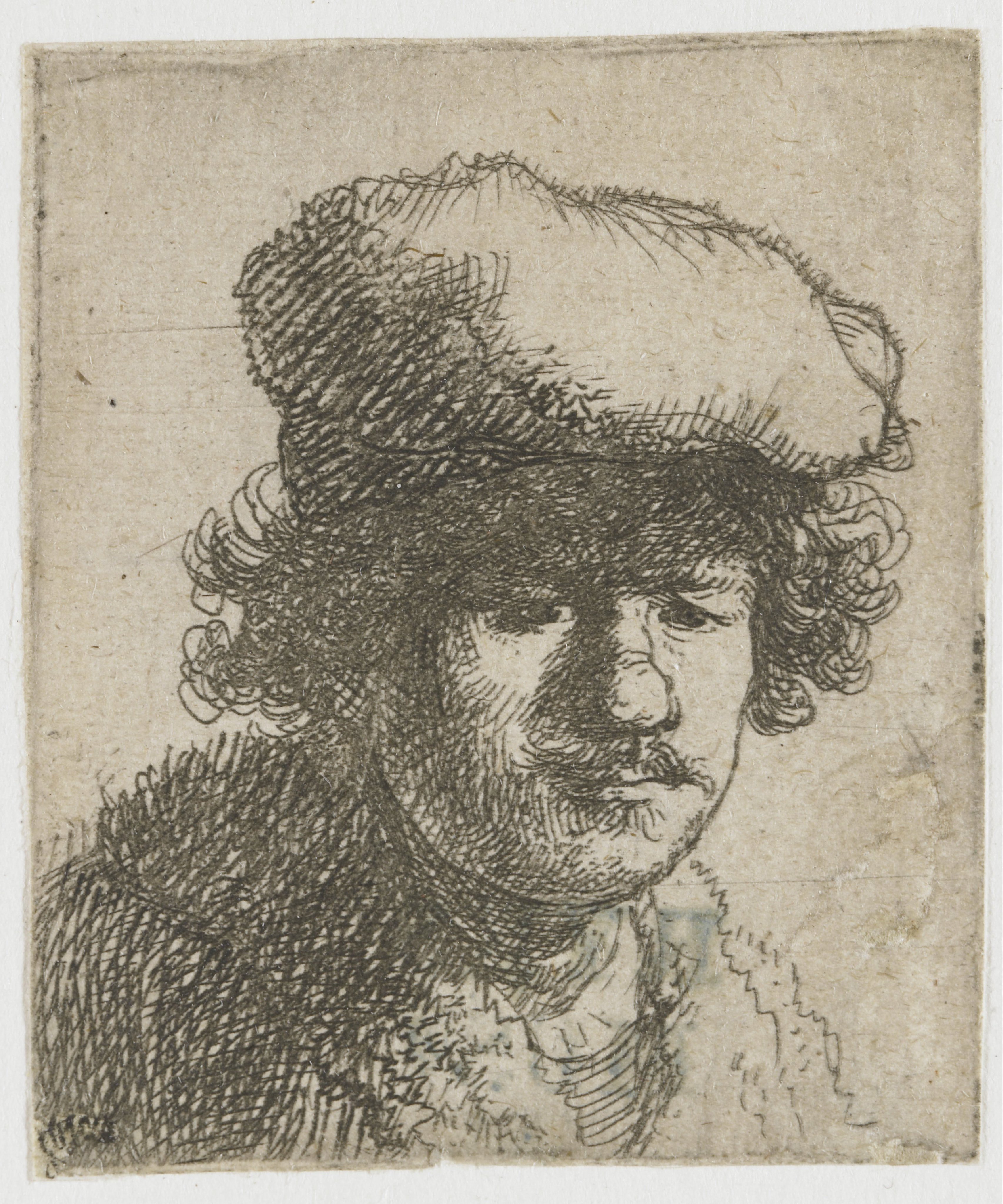 Self-portrait with cap pulled forward
