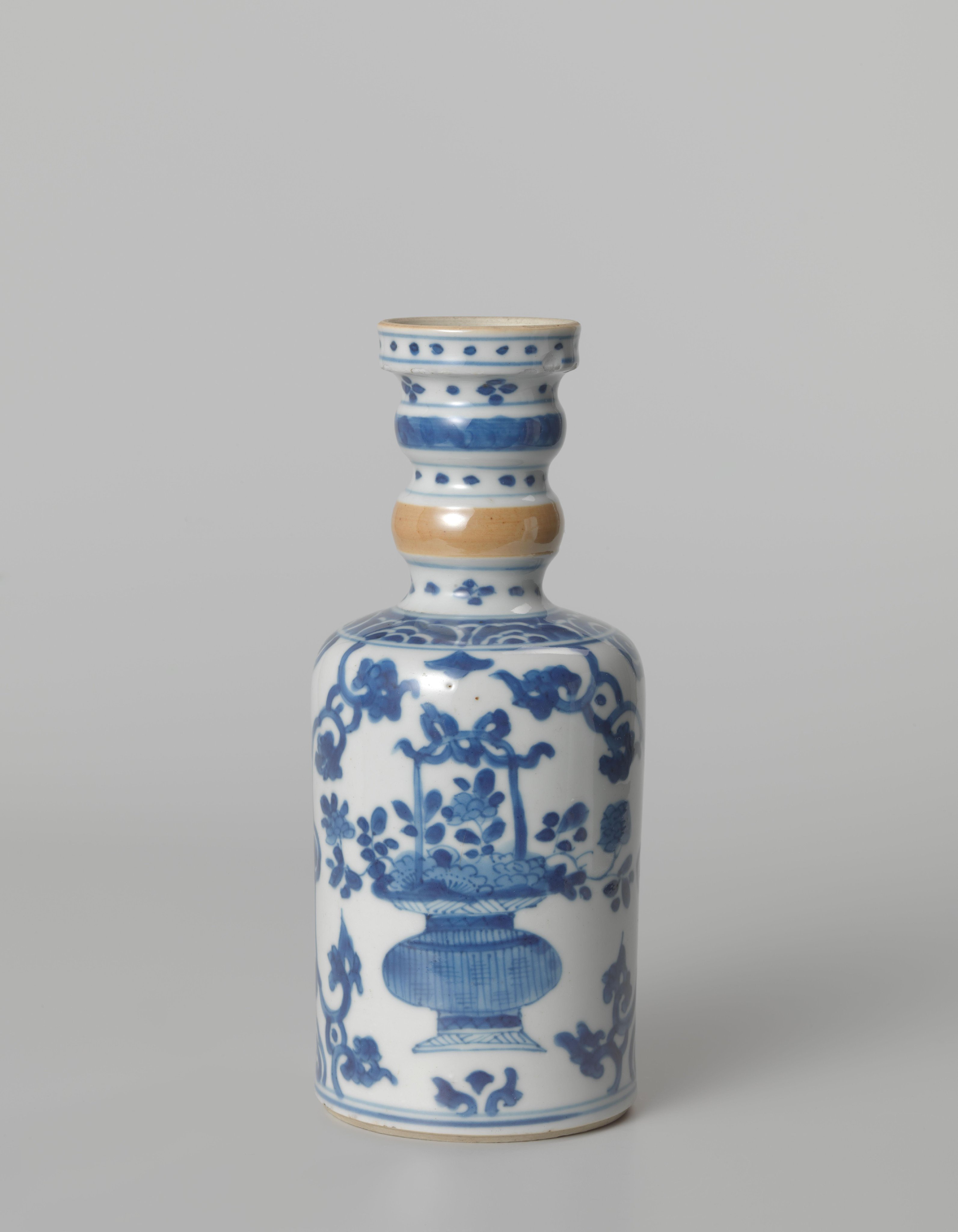 Bottle vase with flower baskets and floral scrolls