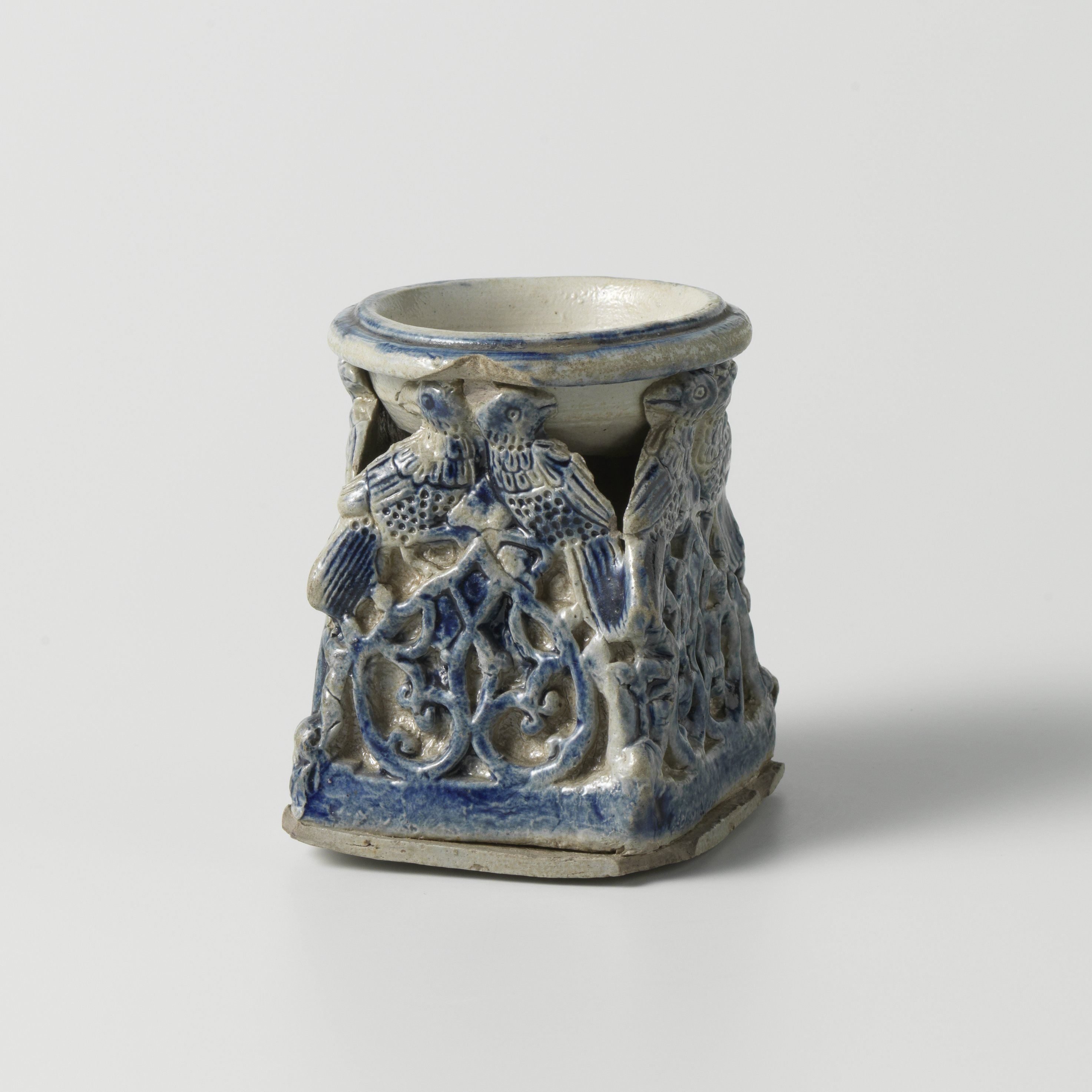 Salt cellar with bird decoration