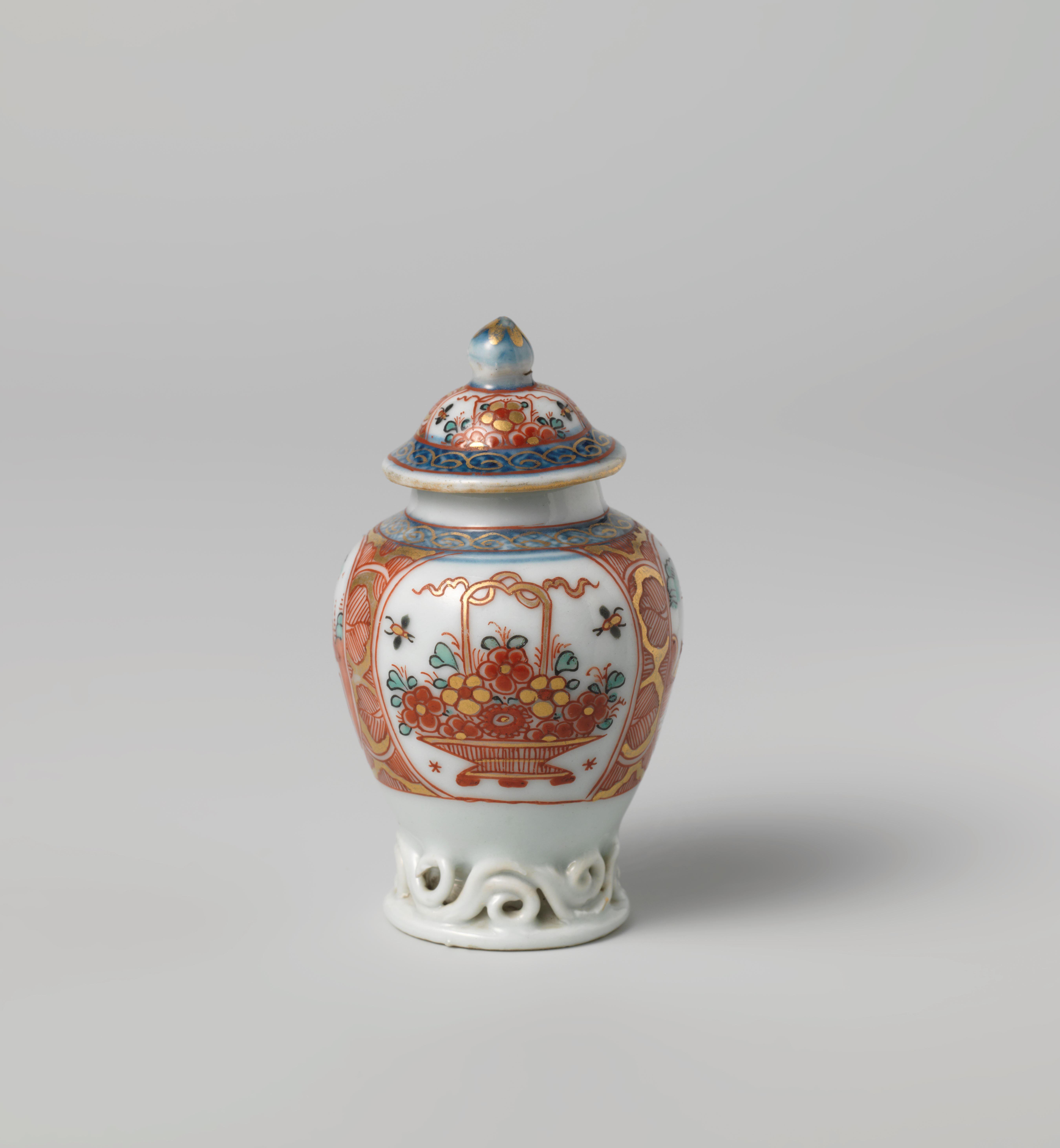 Ovoid tea caddy with flower basket and water landscape in panels