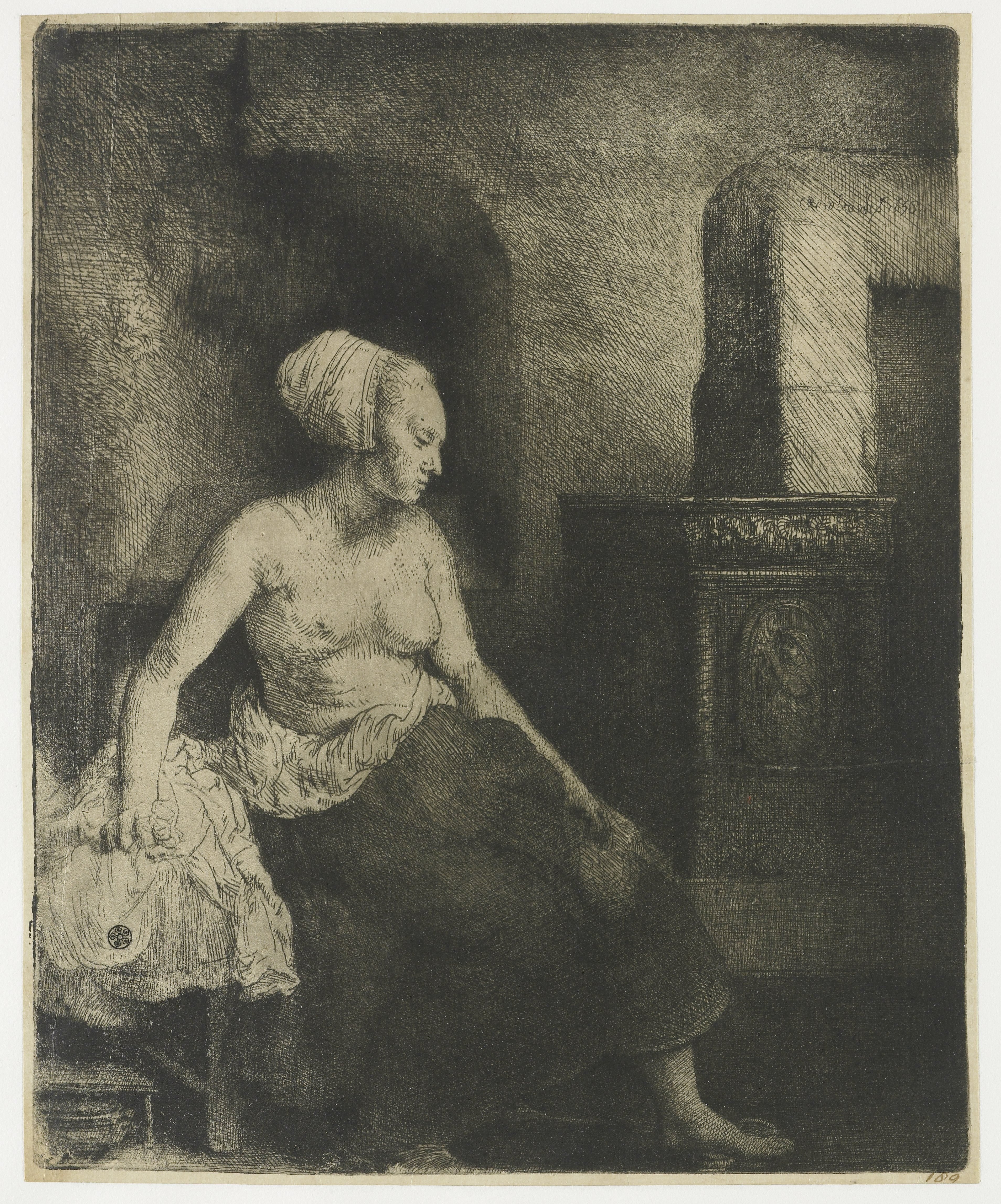 Woman sitting half dressed beside a stove