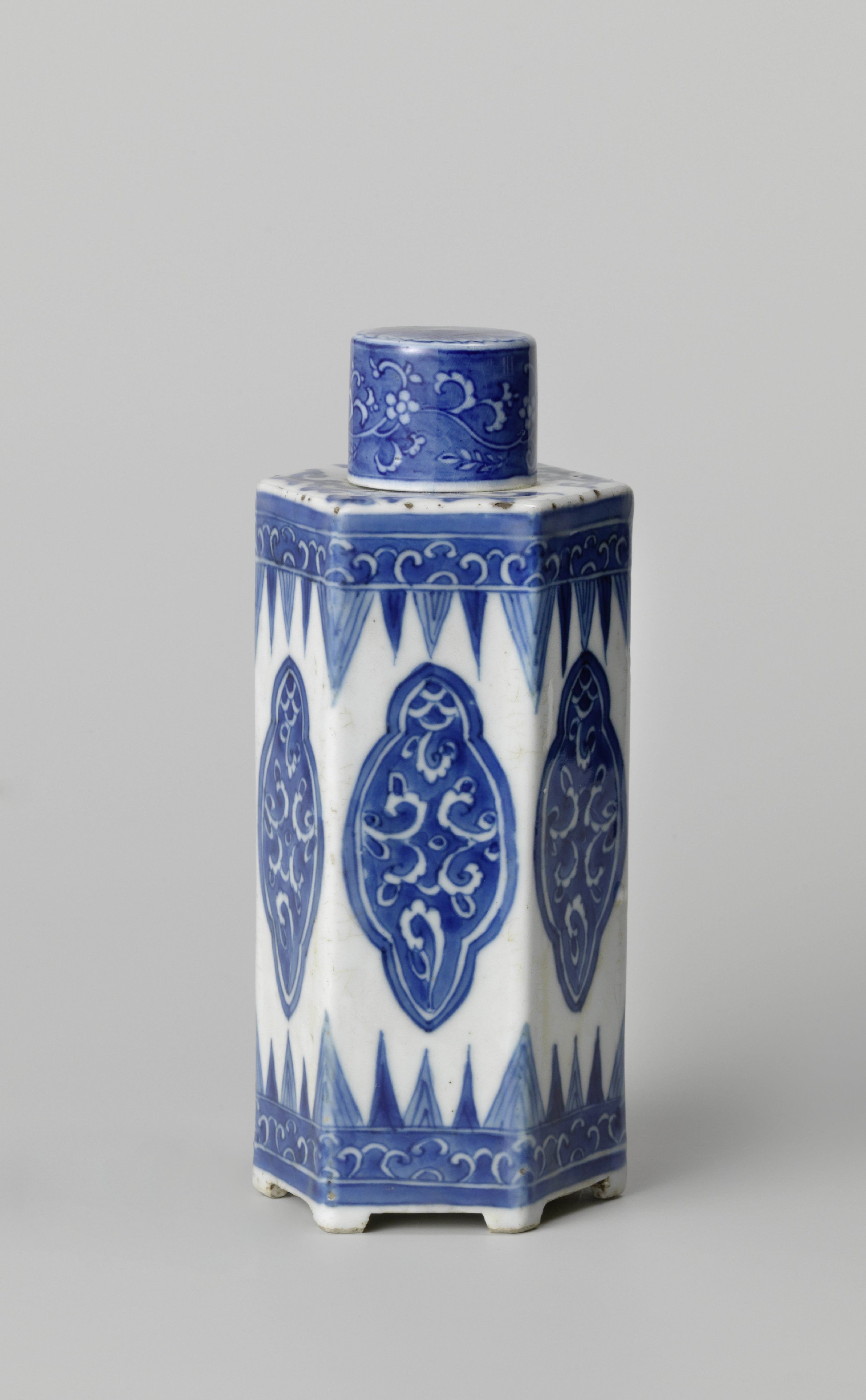 Hexagonal tea caddy with floral scrolls and petal borders