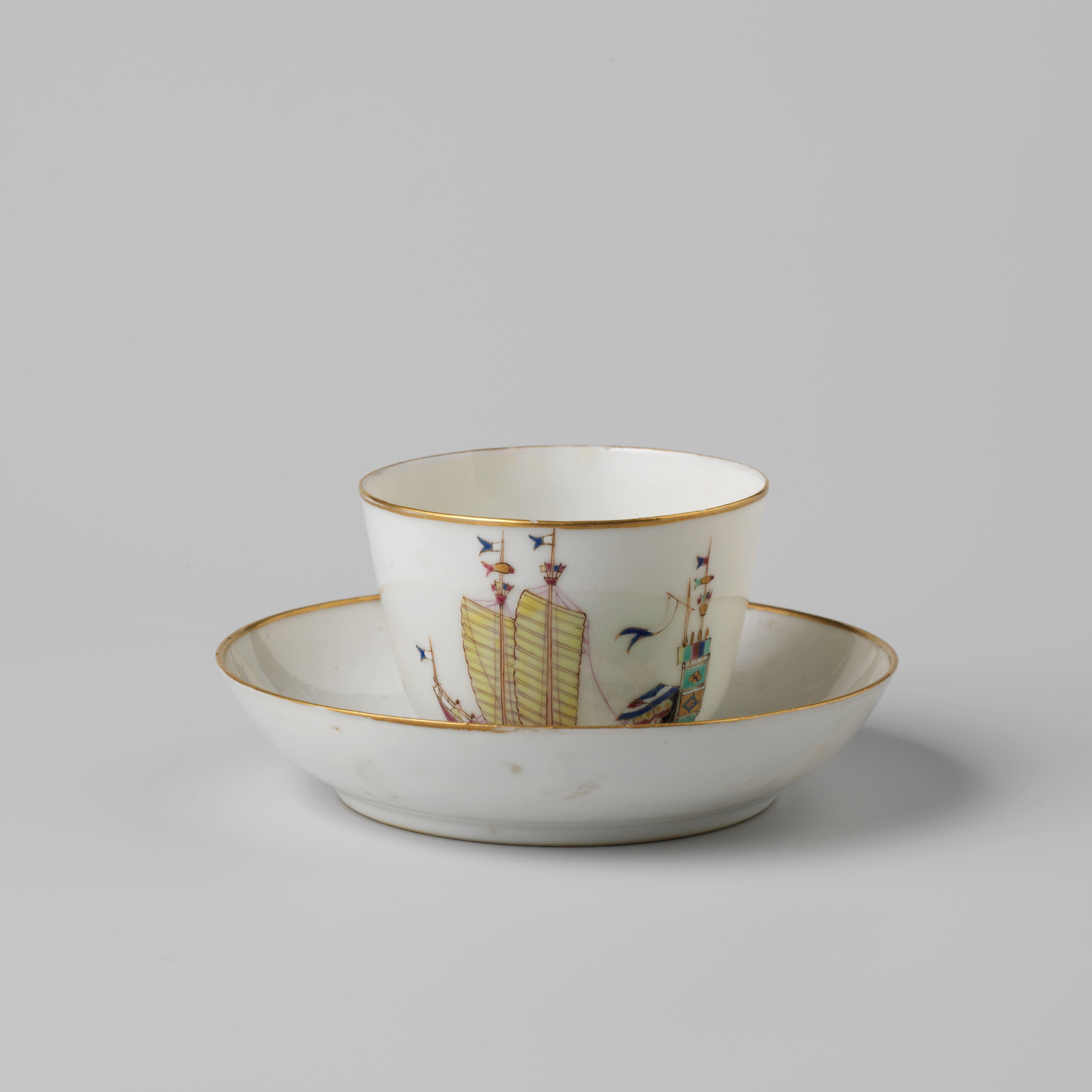Cup and saucer with a Chinese junk and the arms of Amsterdam