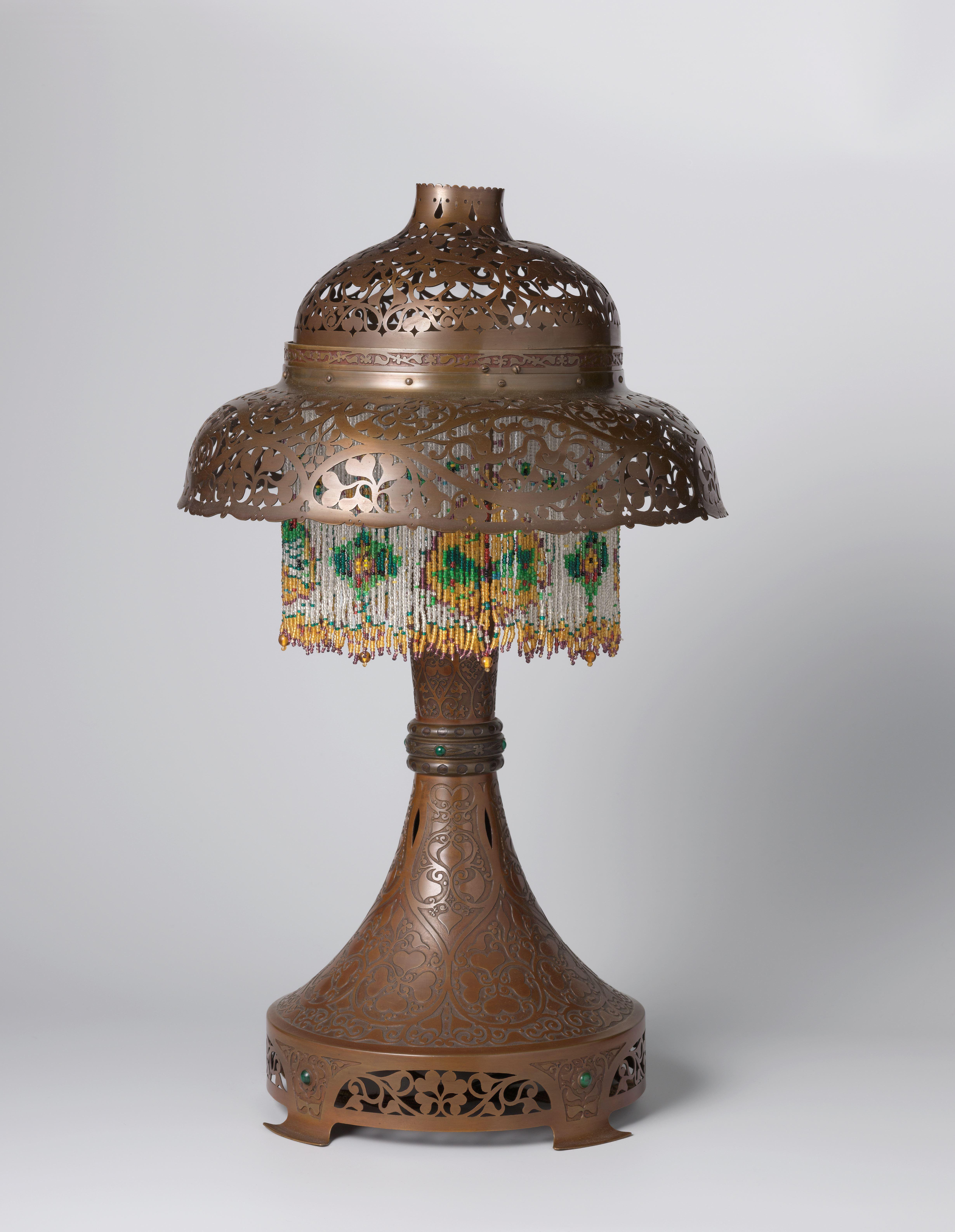 Schemerlamp met ajour-motieven