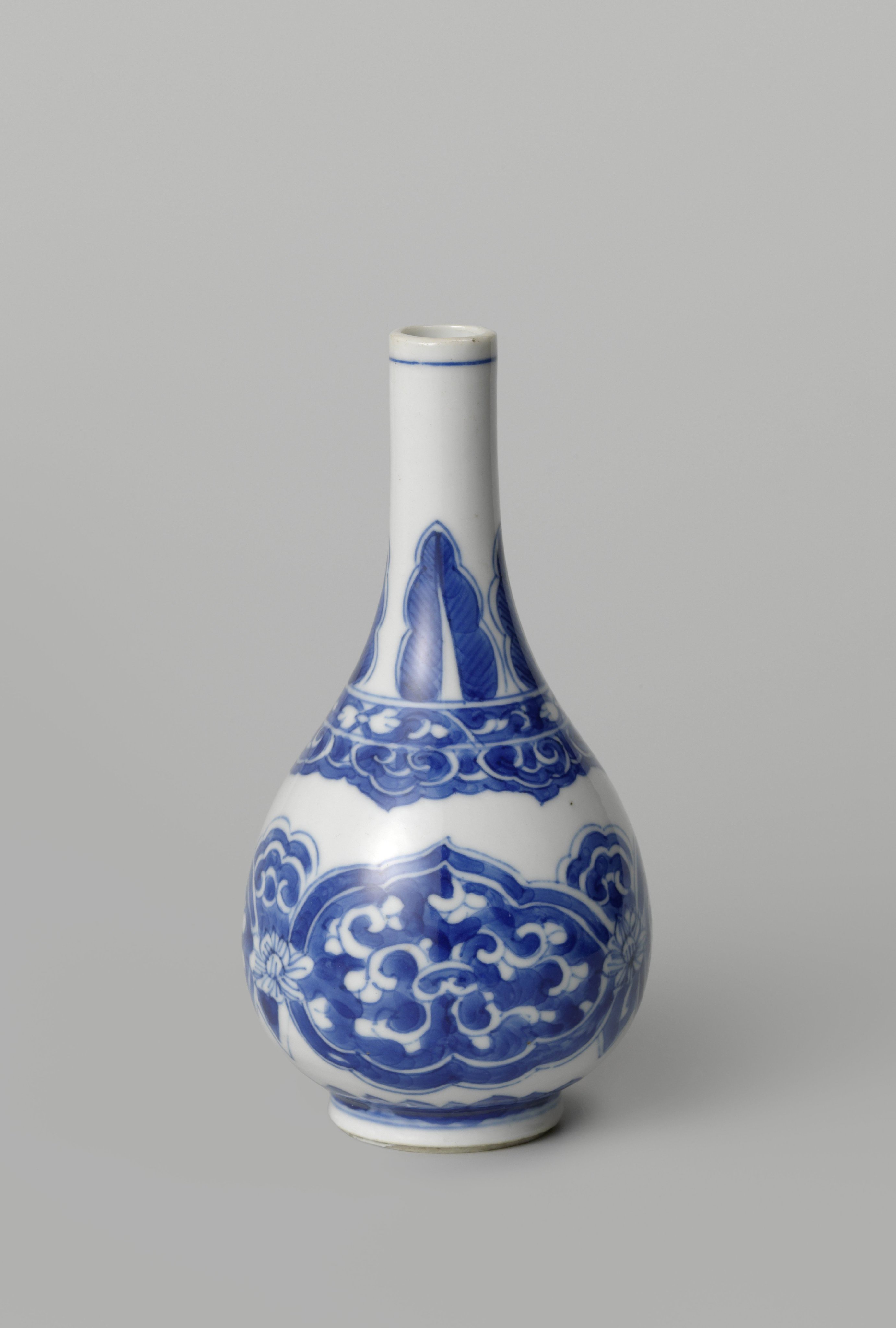 Pear-shaped bottle vase with floral scrolls and petals