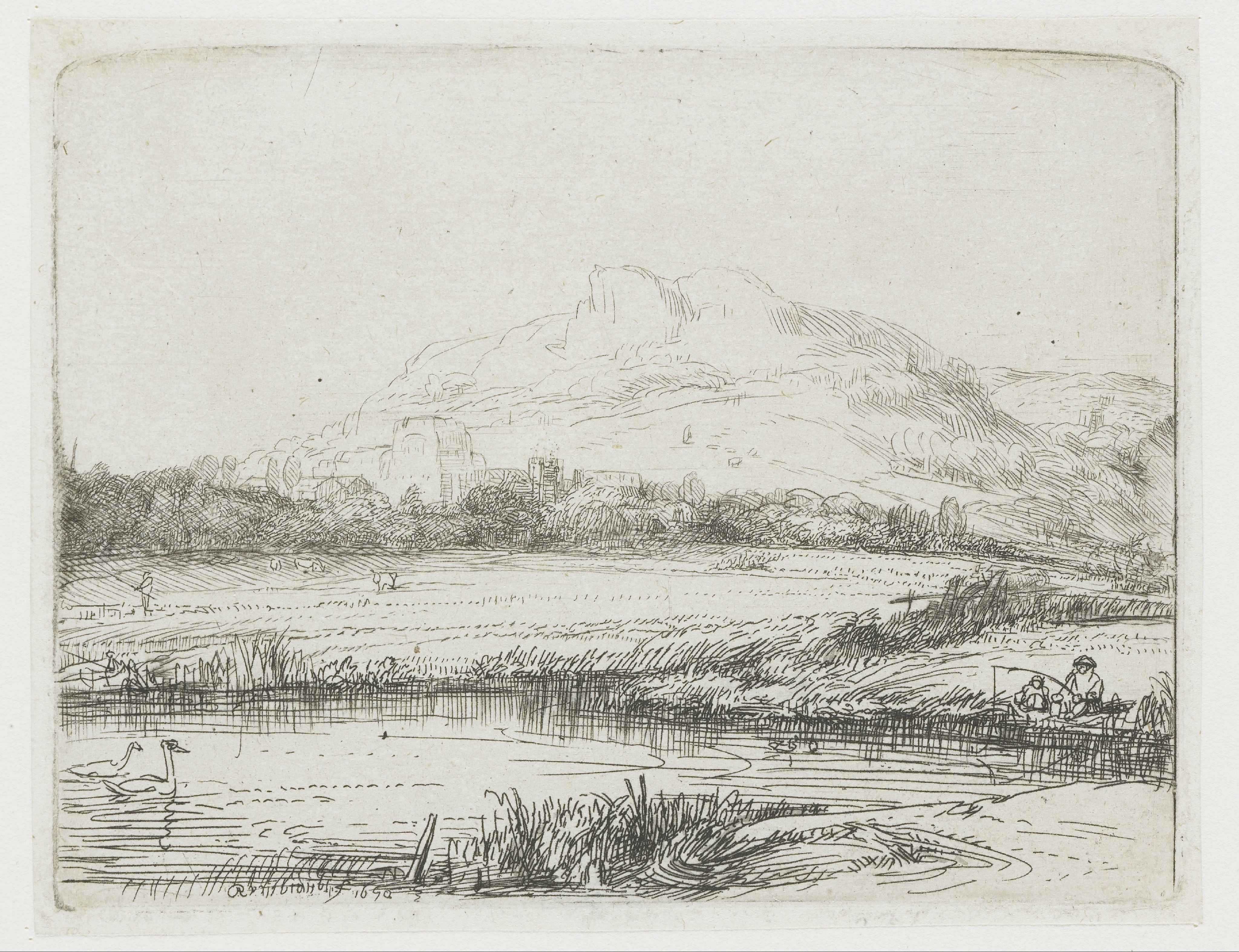 Canal with an angler and two swans