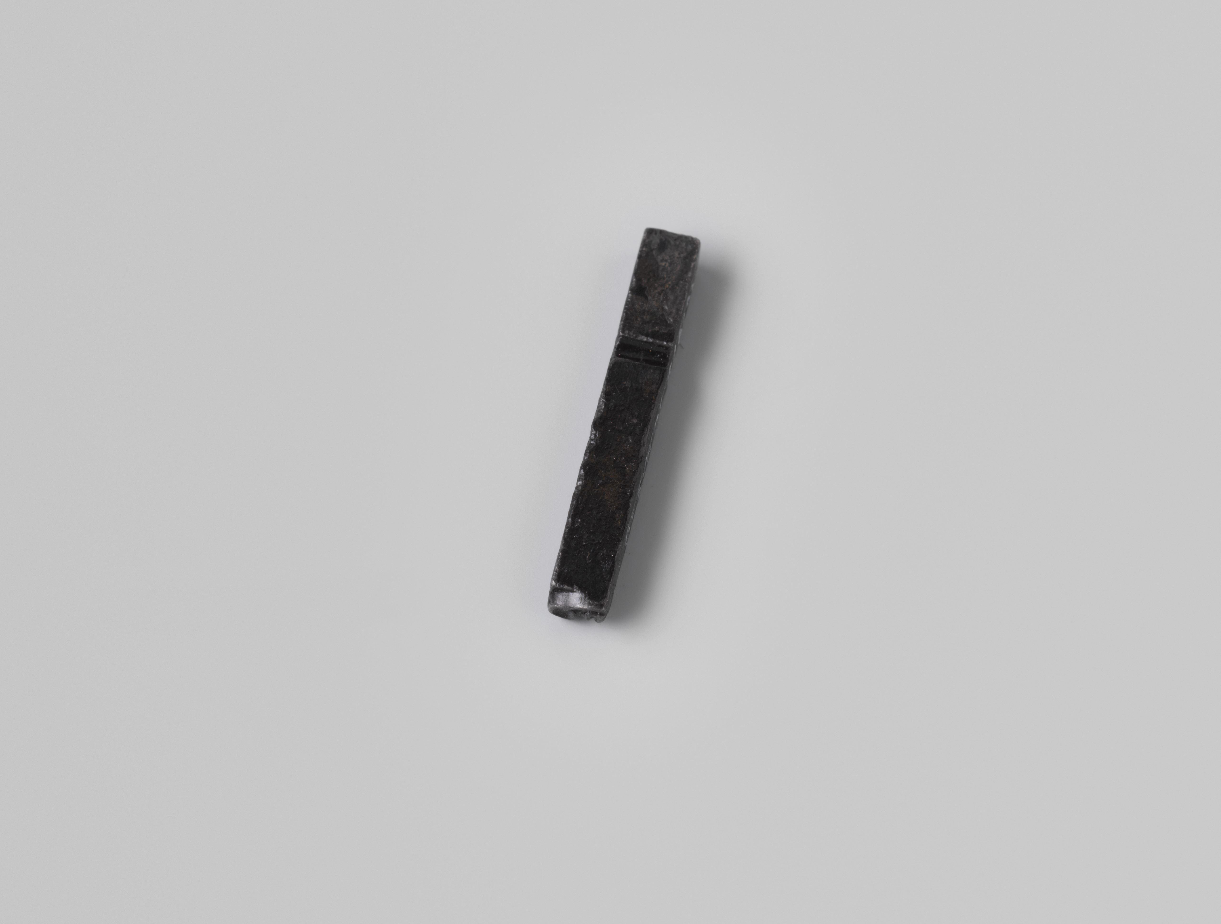 Printing type with probably a Malay character from the wreck of the Dutch East India ship Hollandia