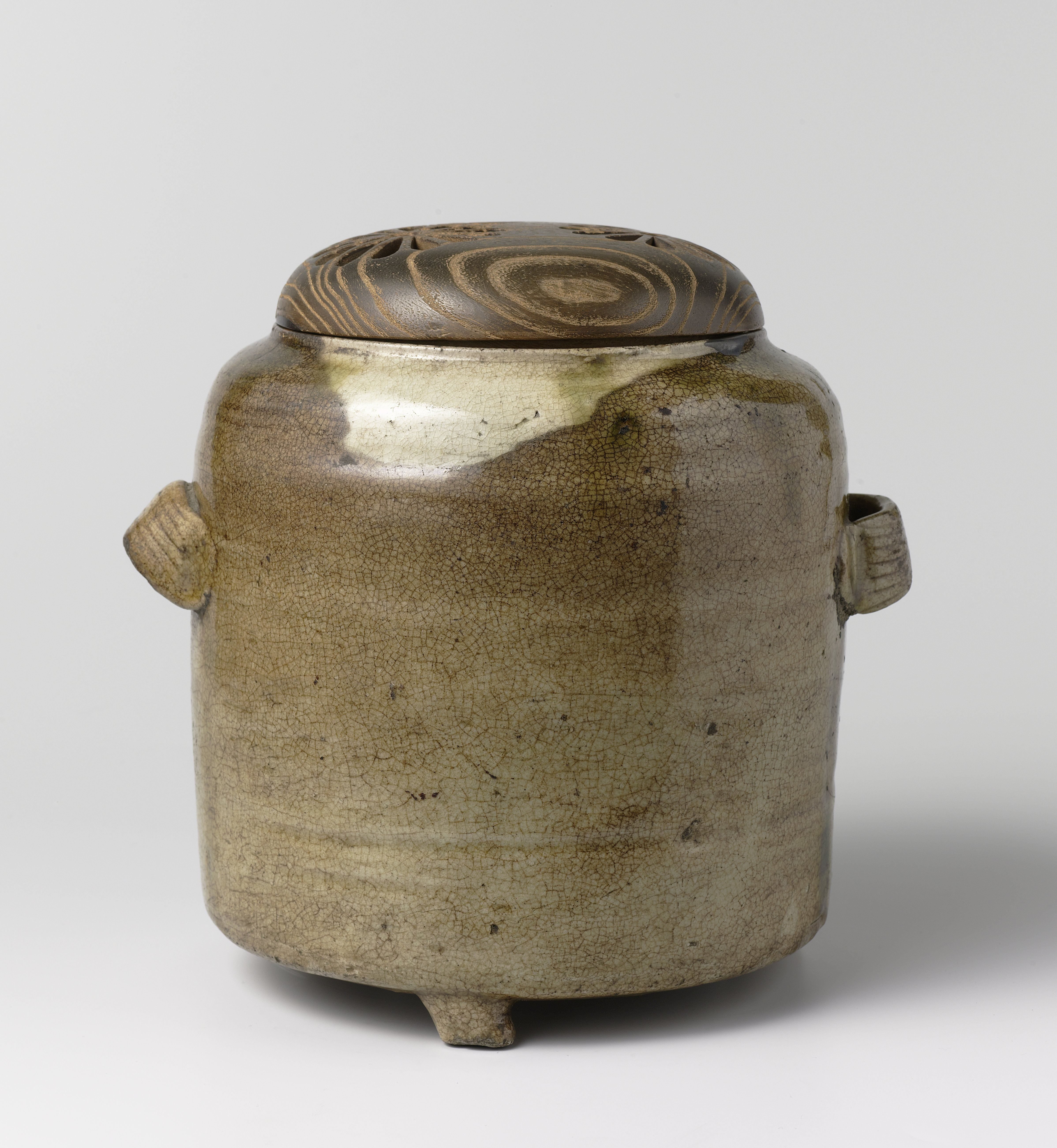 Charcoal burner with a wooden cover