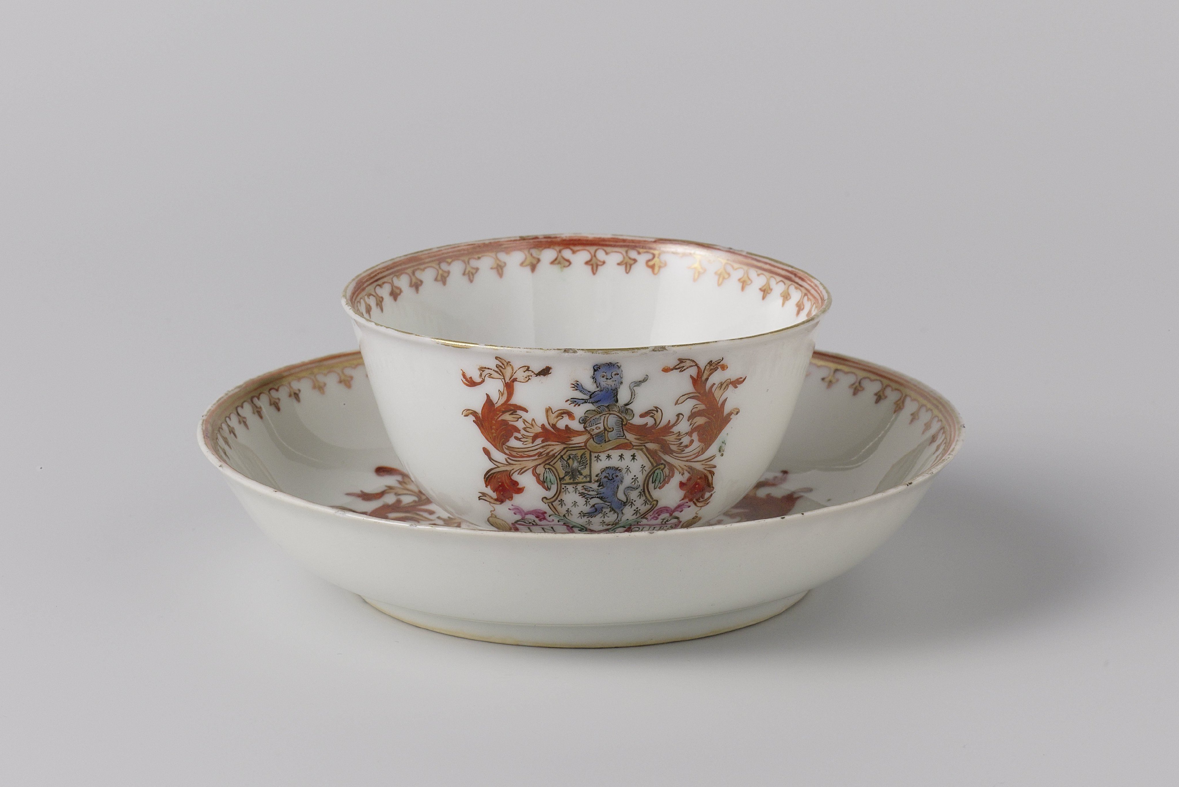 Bell-shaped cup and saucer with the arms of the Edwards family