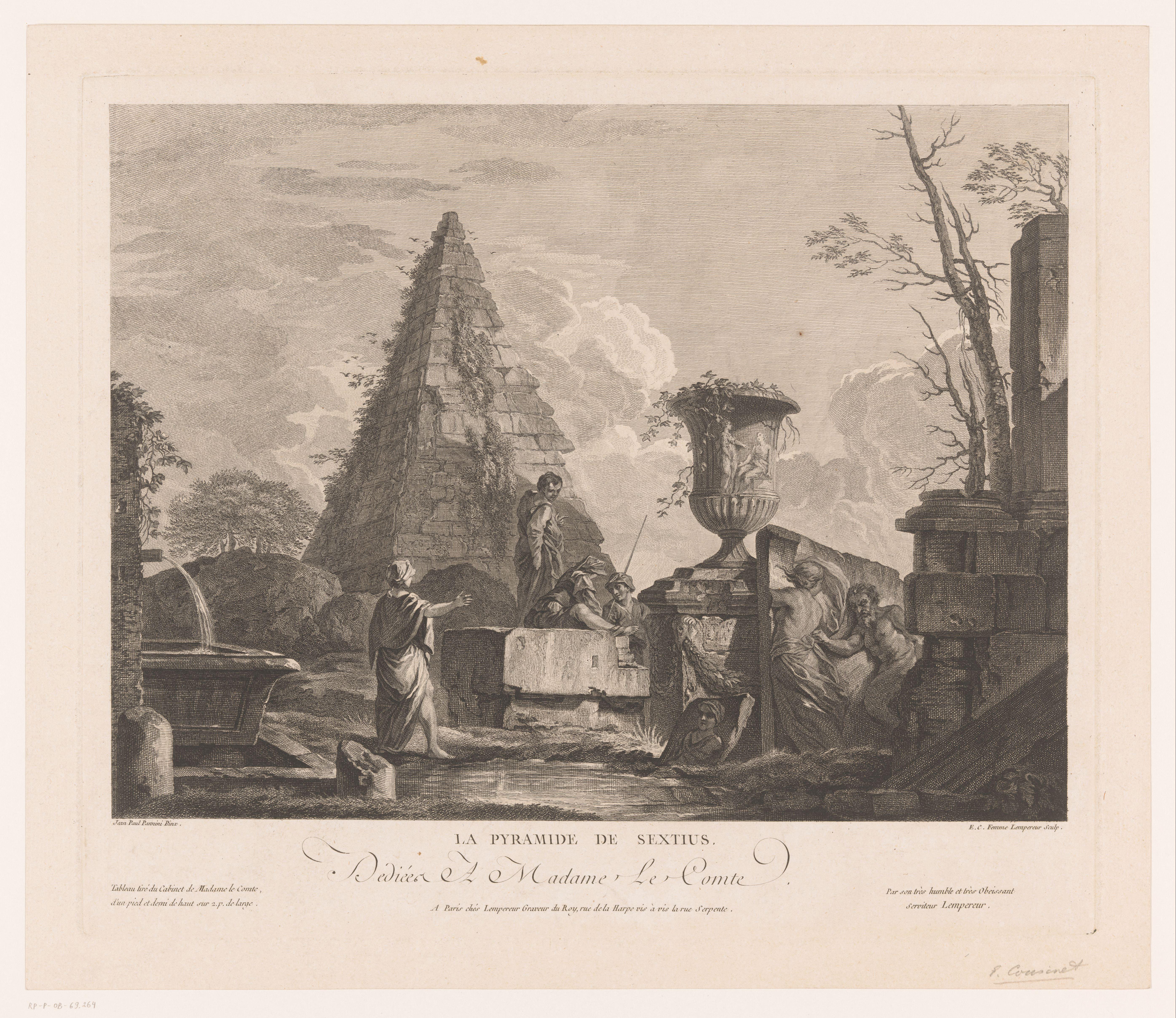 Twee vrouwen en twee mannen bij de piramide en ruïnes