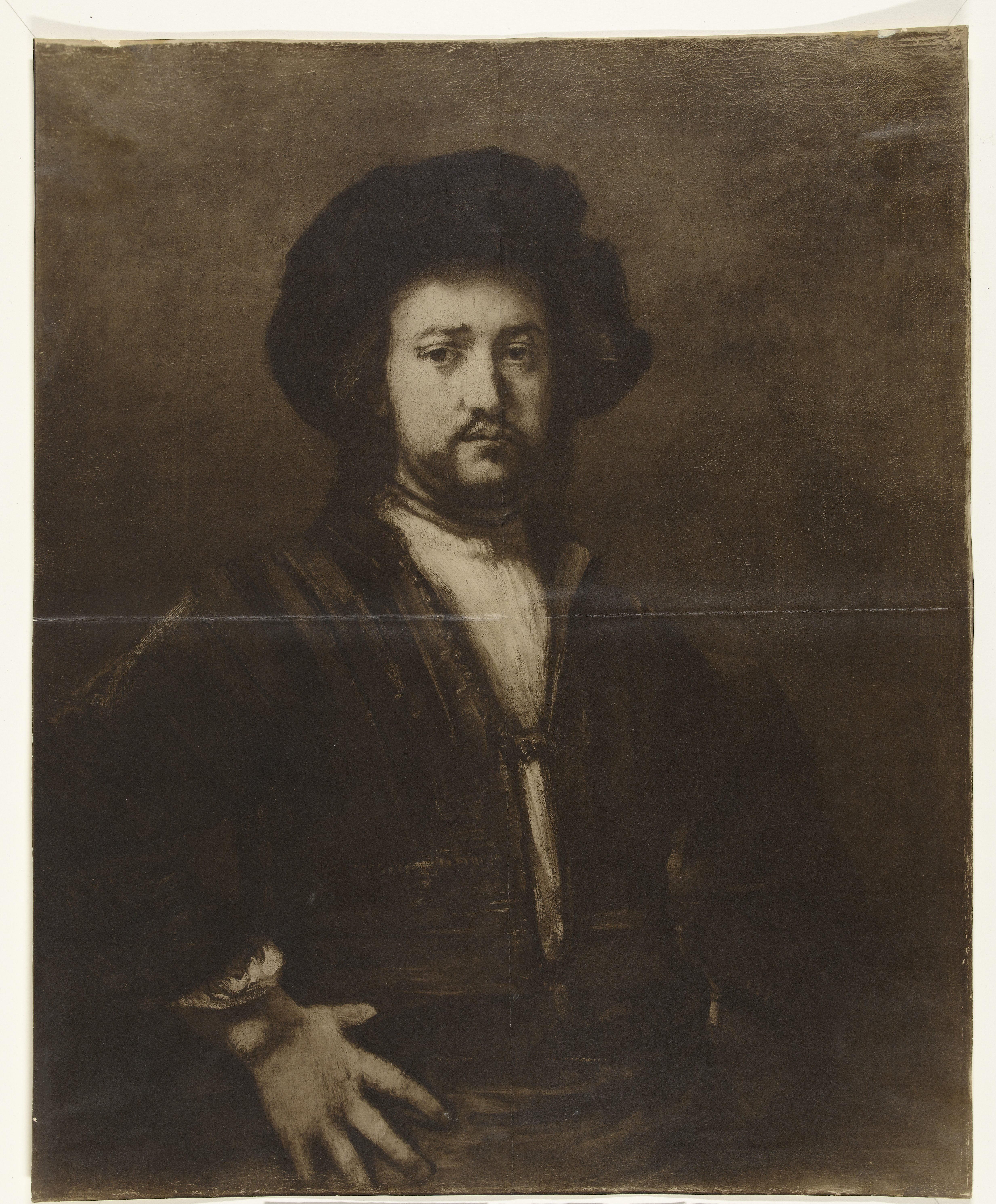 Fotoreproductie van het schilderij 'Portret van een man', toegeschreven aan Rembrandt