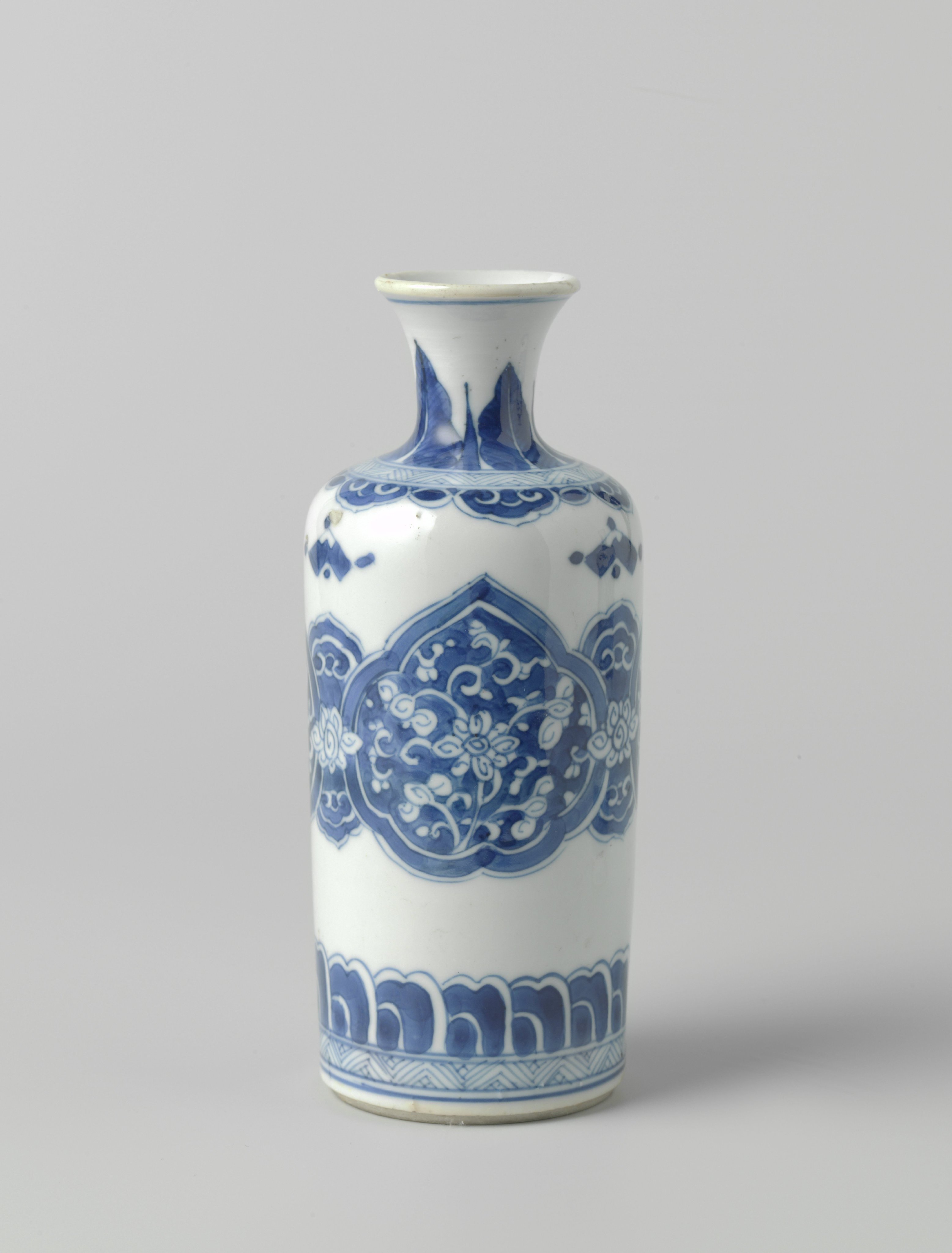 Cilindrical bottle vase with floral scrolls in reserve in ruyi-shaped panels