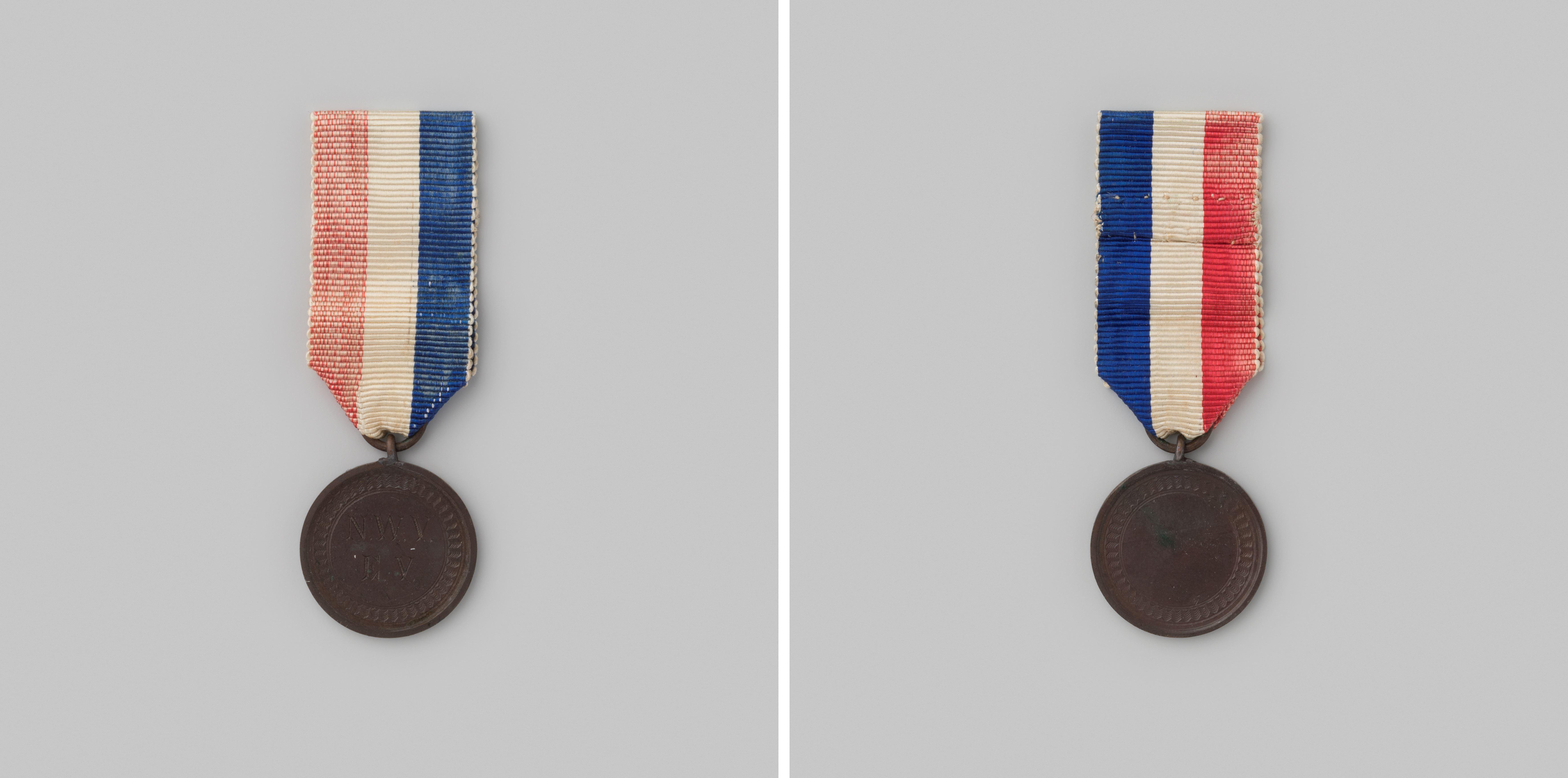 Draagteken voor de schutterij met de letters N.W.V.E.V.