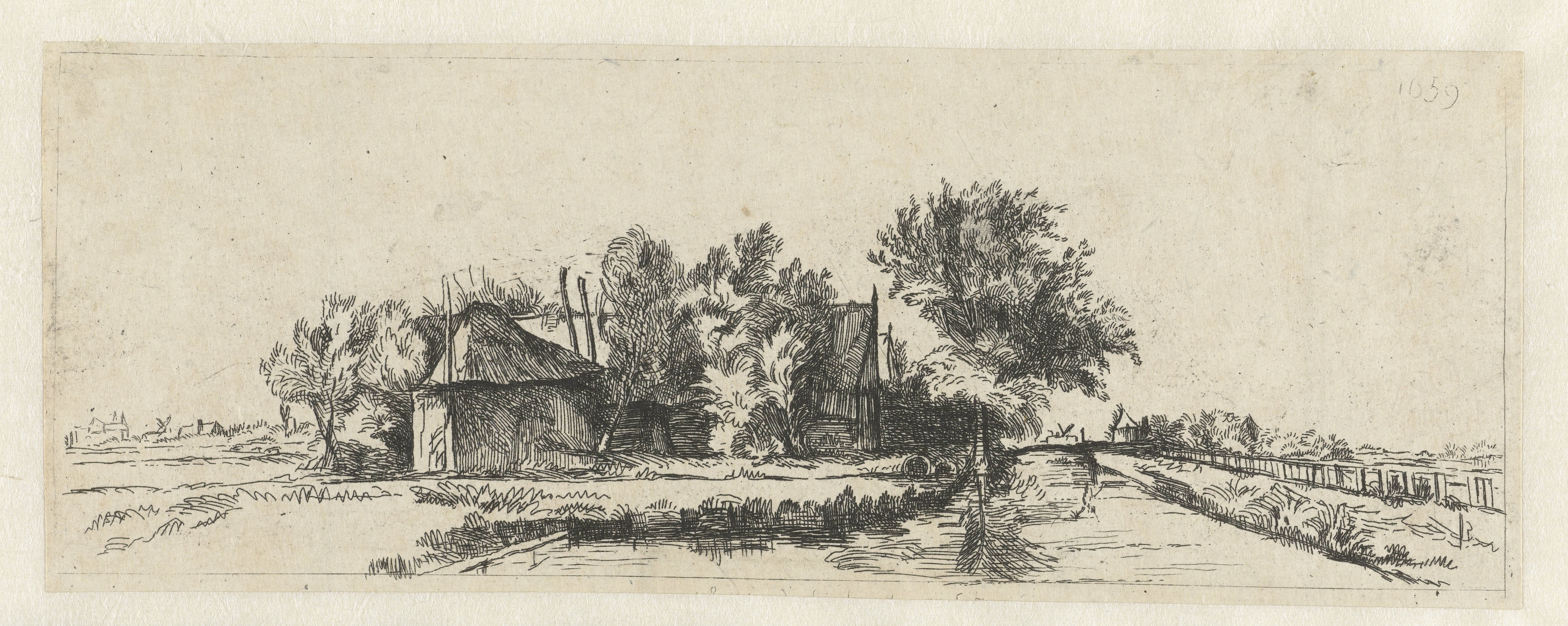 Landschap met een kanaal en hek