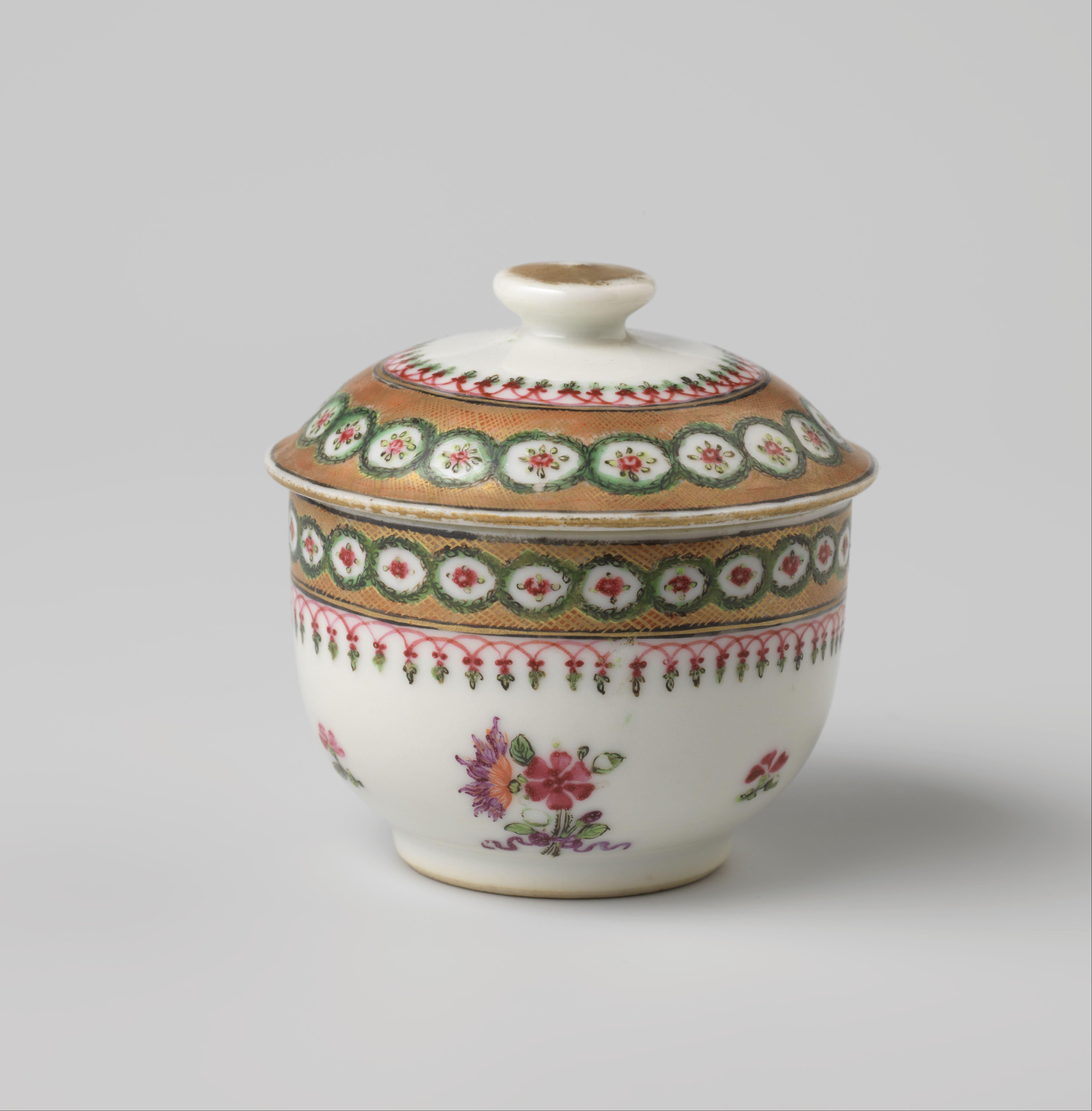 Covered jar with bouquets, scattered flowers and ornamental borders